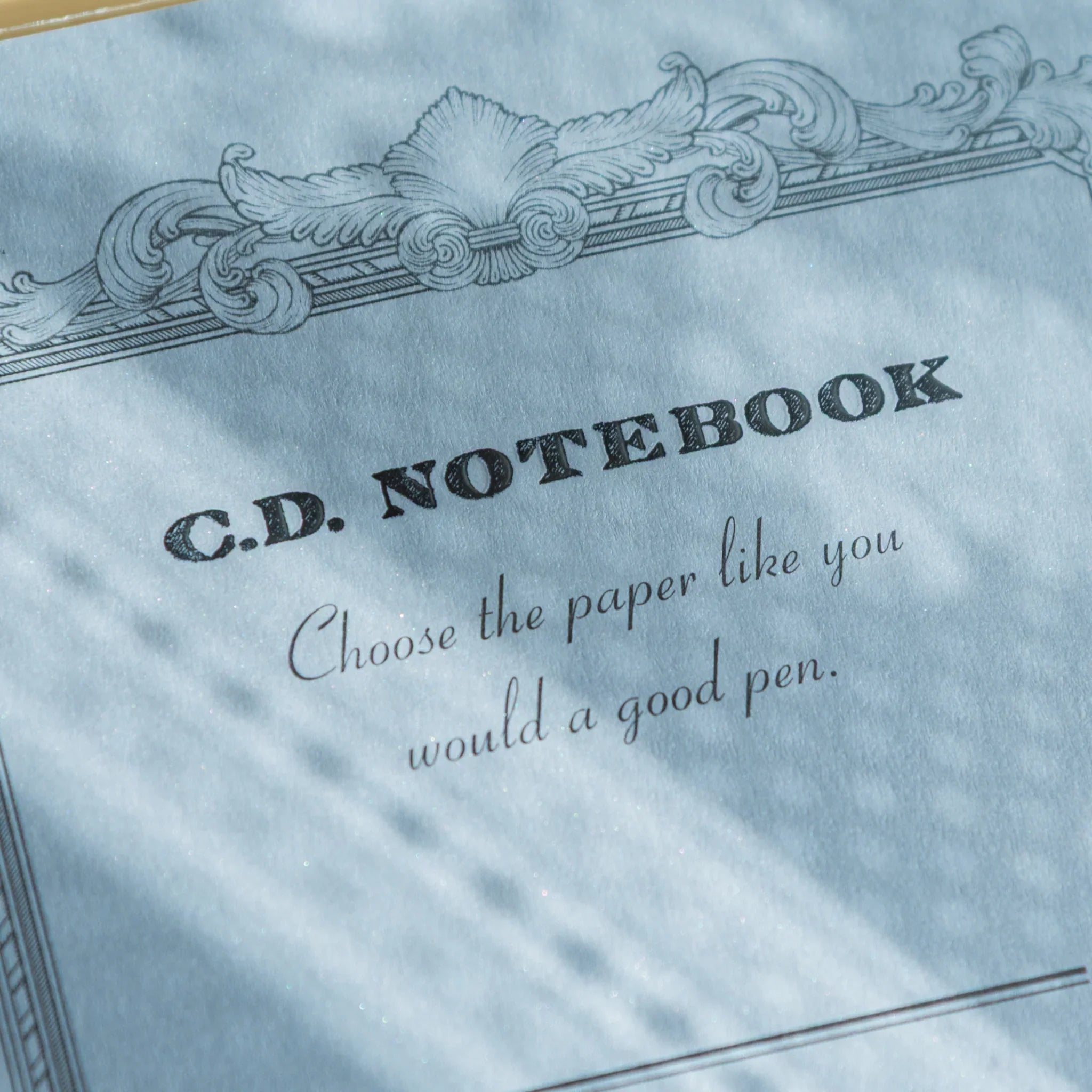 Apica Premium CD A5 notebook cream color interior detail showing light blue ruled lines and professional index layout