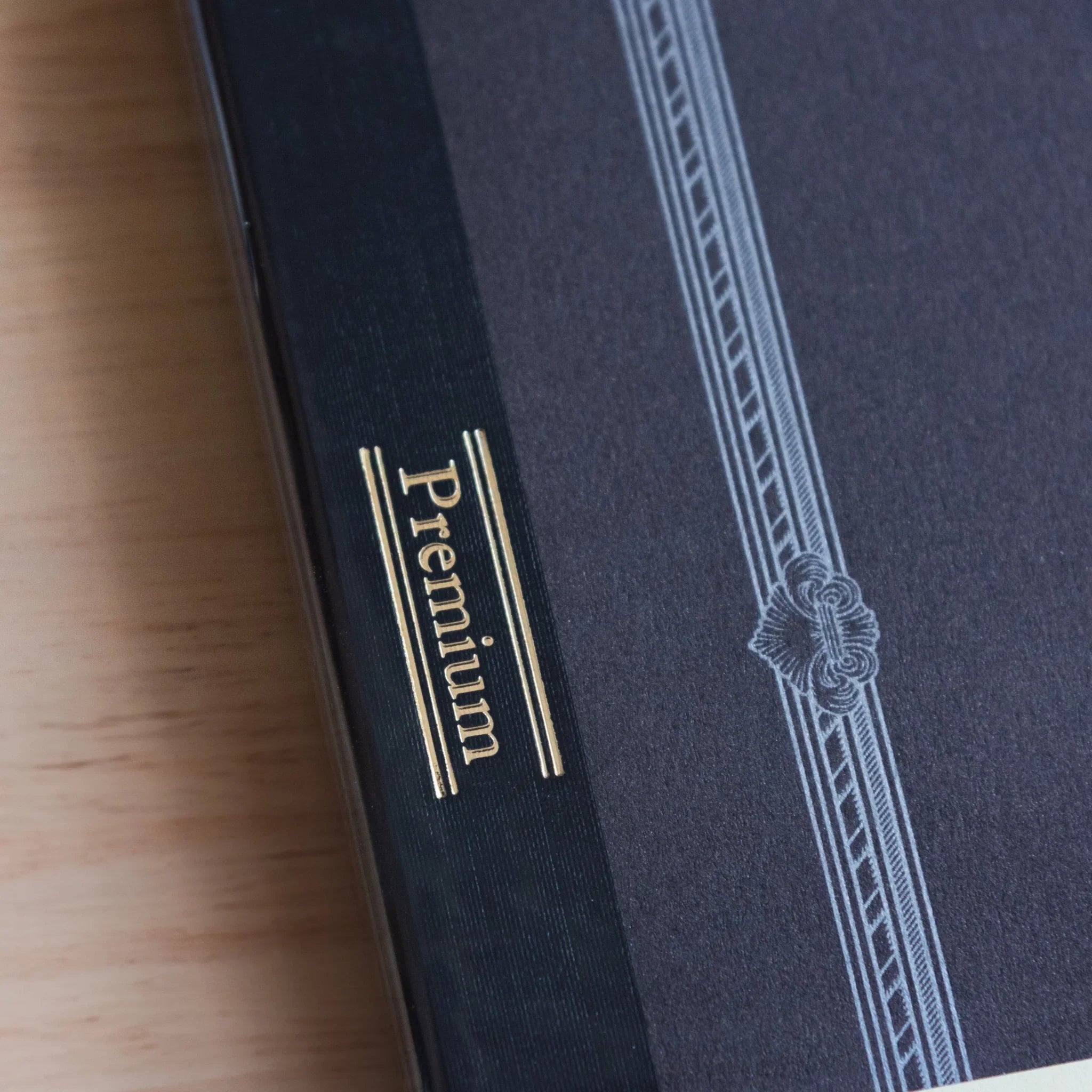 Apica Premium CD Notebook Silky black hard cover side spine view Premium label gold foil stamp Japanese made stationery