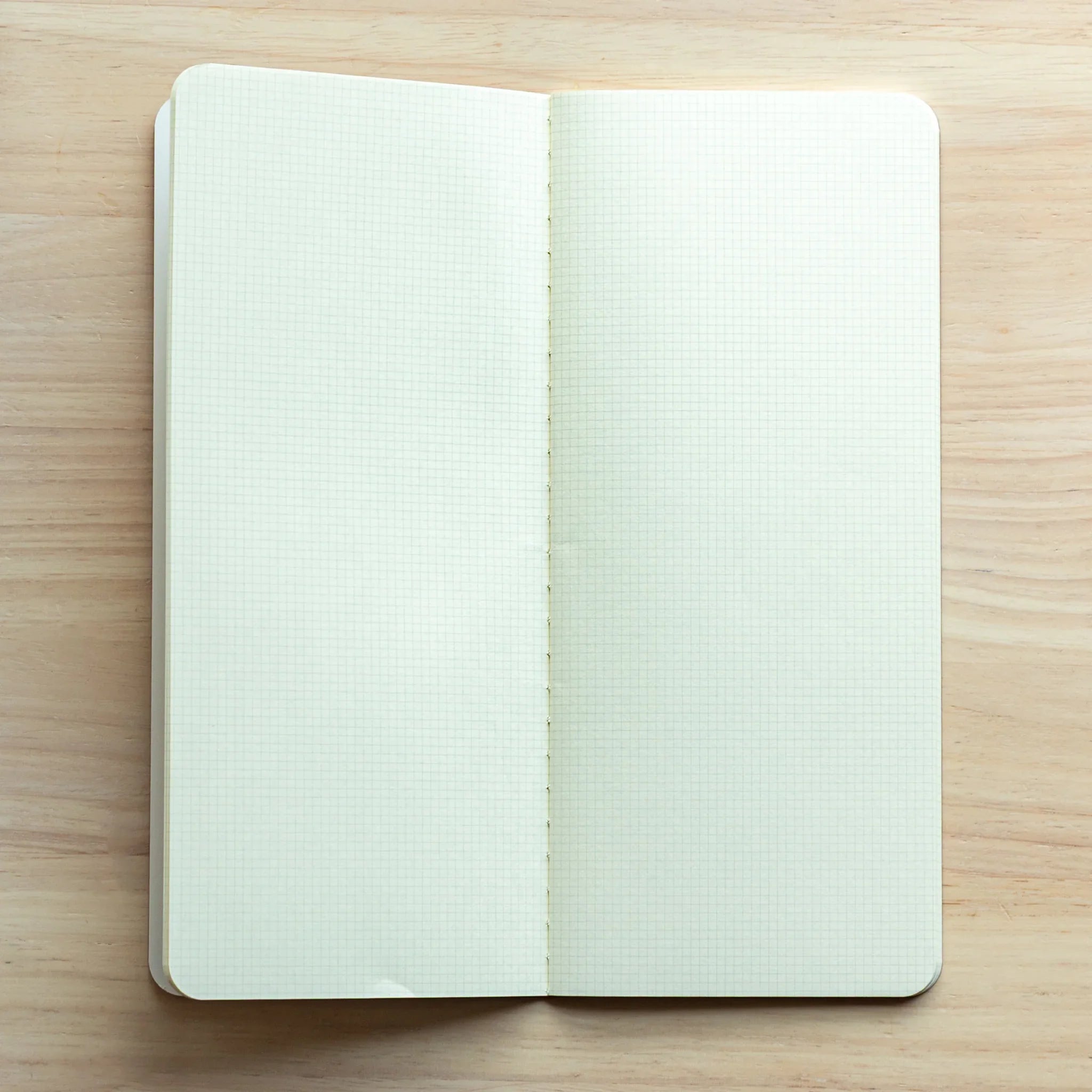 RO-BIKI Basic notebook with 2mm grid shown flat displaying cover and interior layout, quality Japanese writing pad