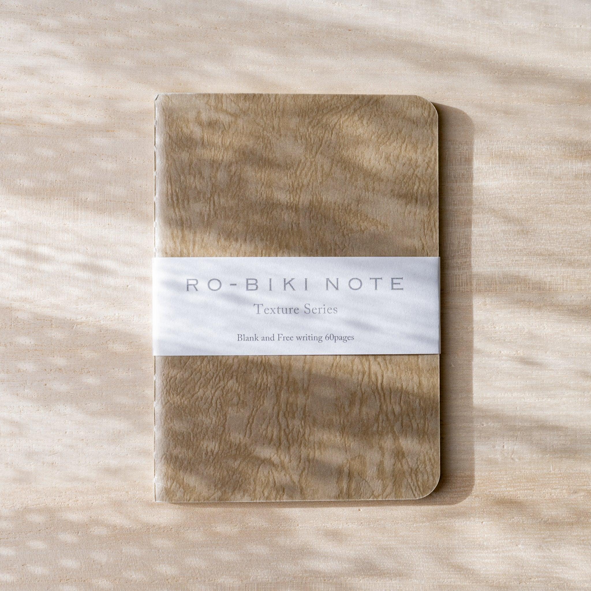 RO-BIKI NOTE fushi brown waxed cover with textured blank notebook, paper belly band and Yamamoto Paper logo