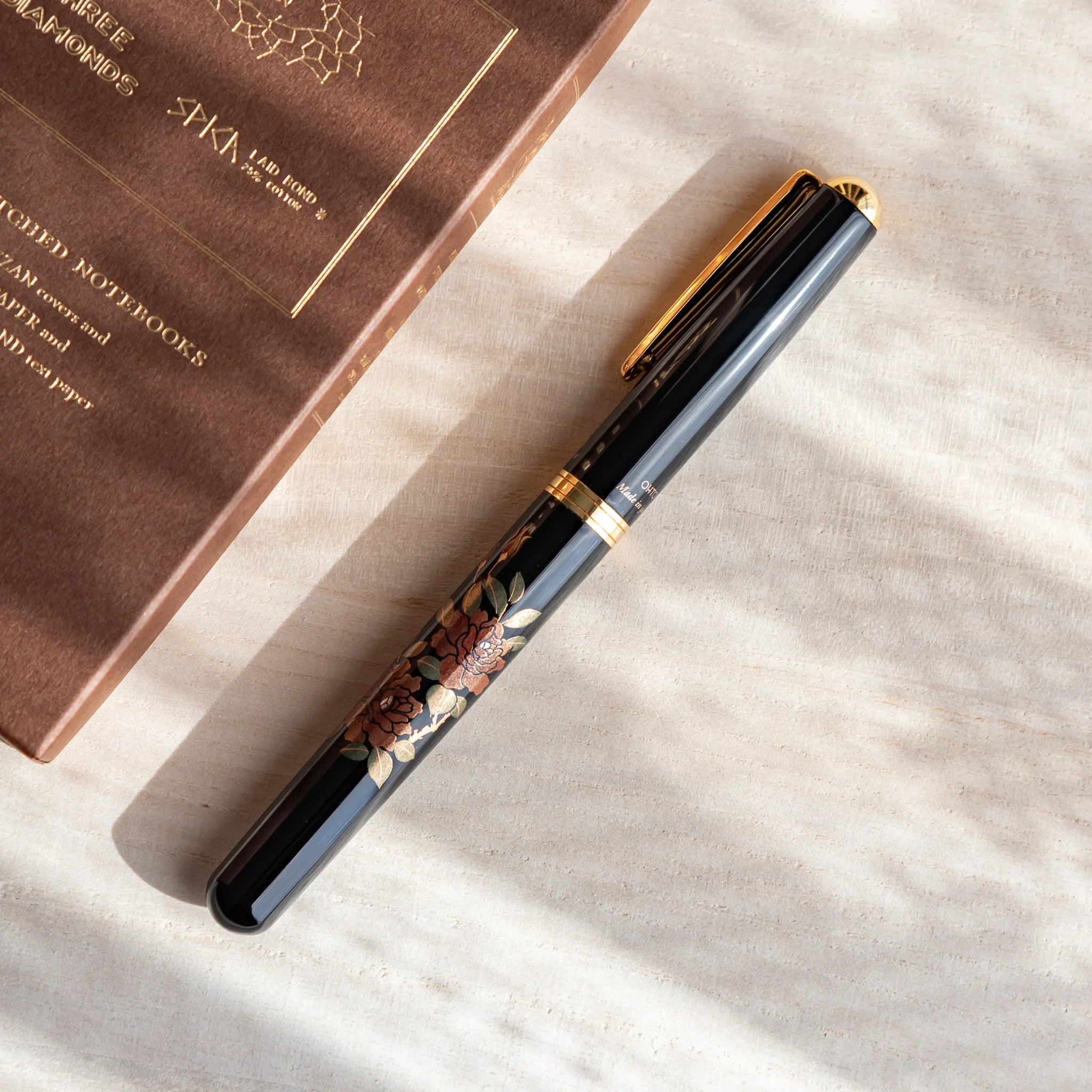 Rose Yamanaka fountain pen with lacquer design shown in composition in detailed composition product composition view