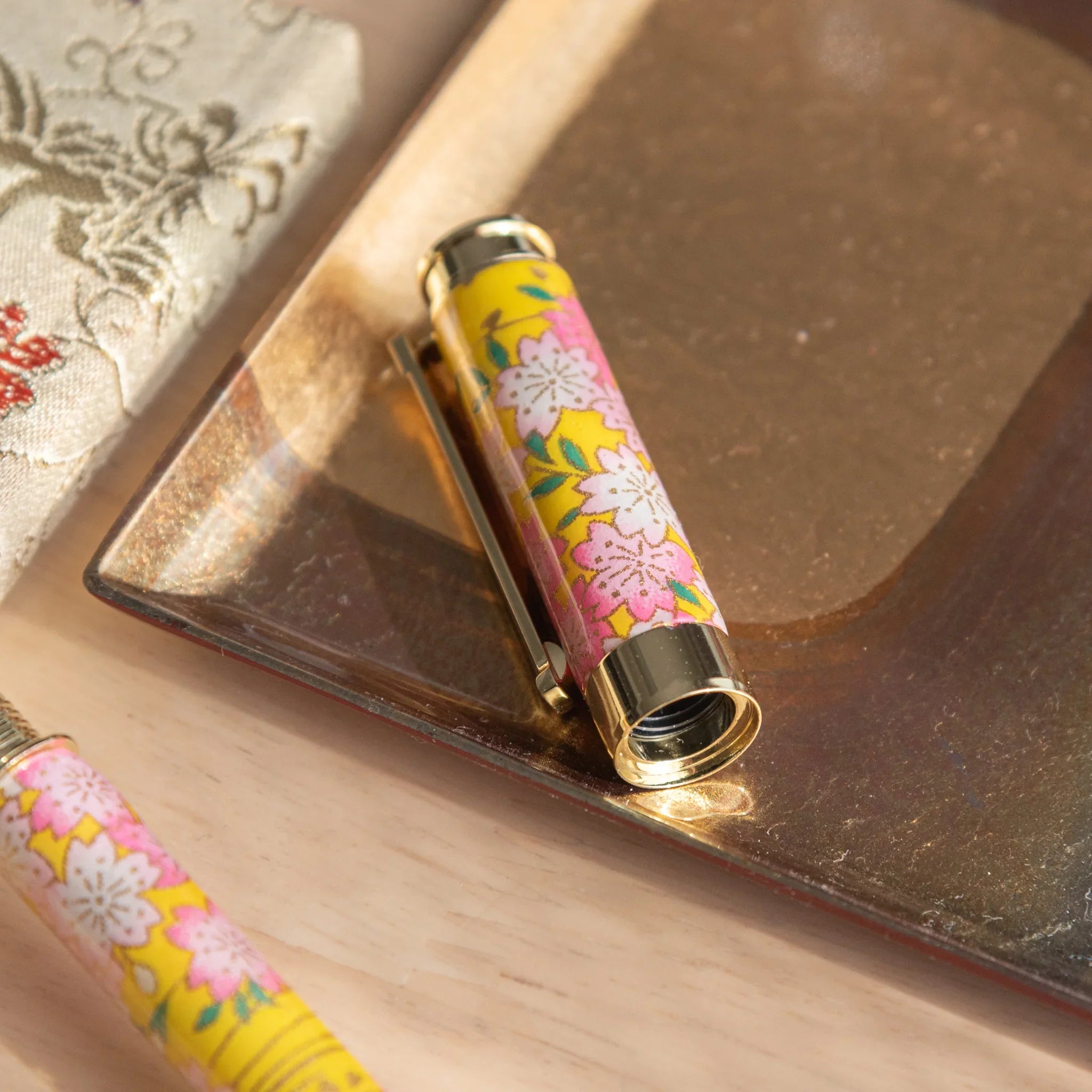 Sakura and Canola Mino washi fountain pen displaying complete white pink flowers with yellow canola design angle