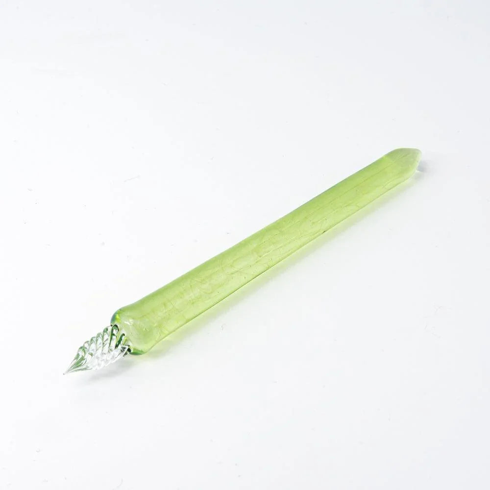 Smoke in Verdure glass dip pen diagonal view on white background showing grey-green glass barrel nib