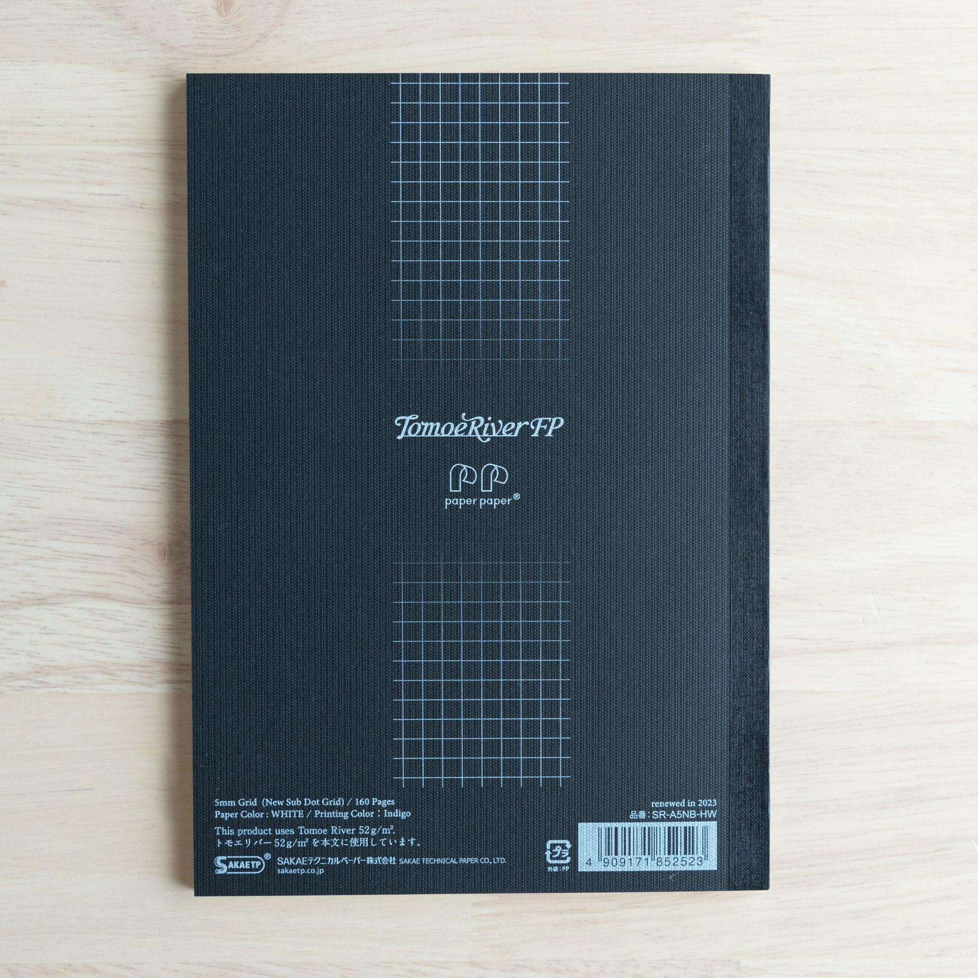 Sanzen soft cover A5 journal, tilted view of flexible protective cover and traditional binding design