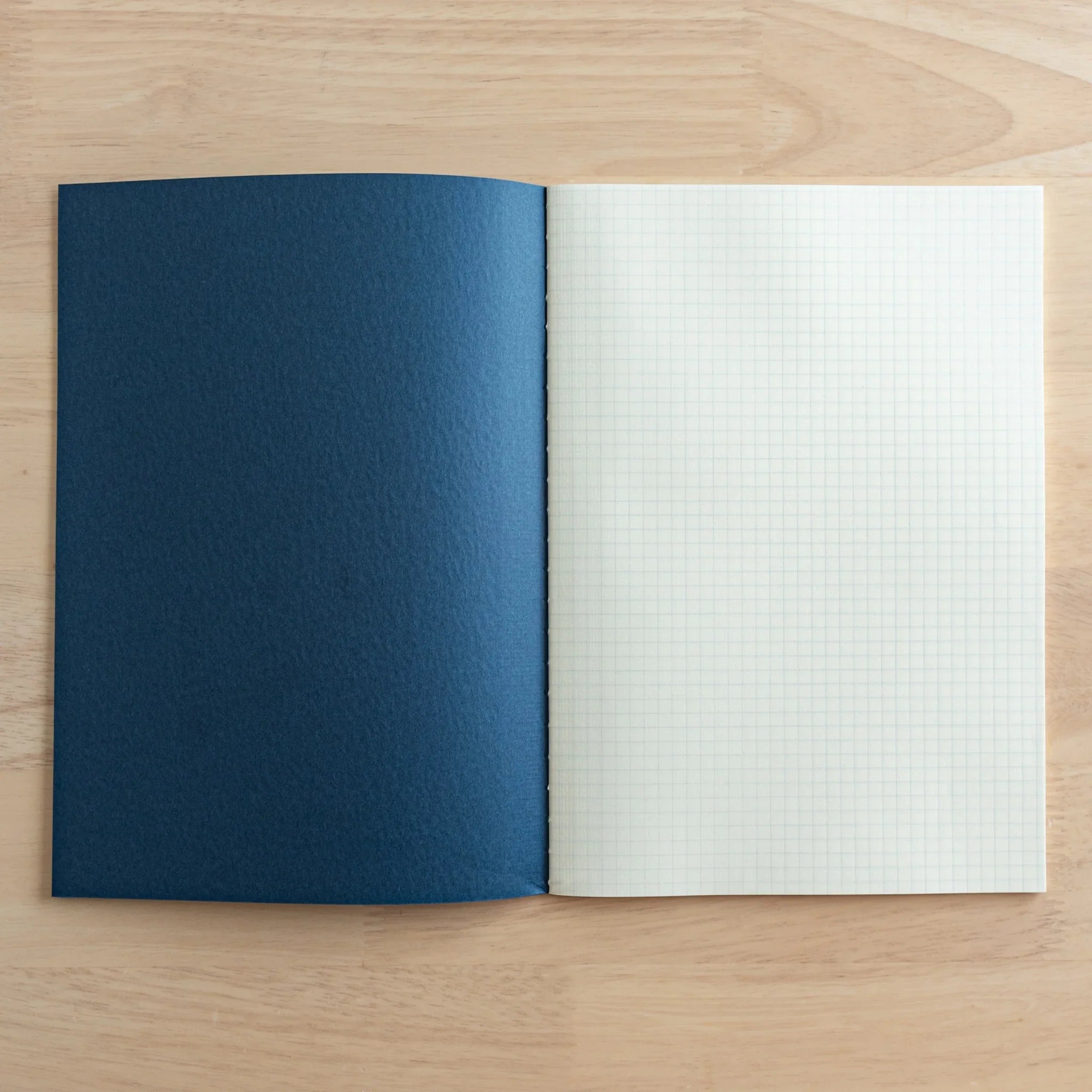 Tsubame Fools Cream Notebook in profile showing cover and spine detail illustrating binding type and page count