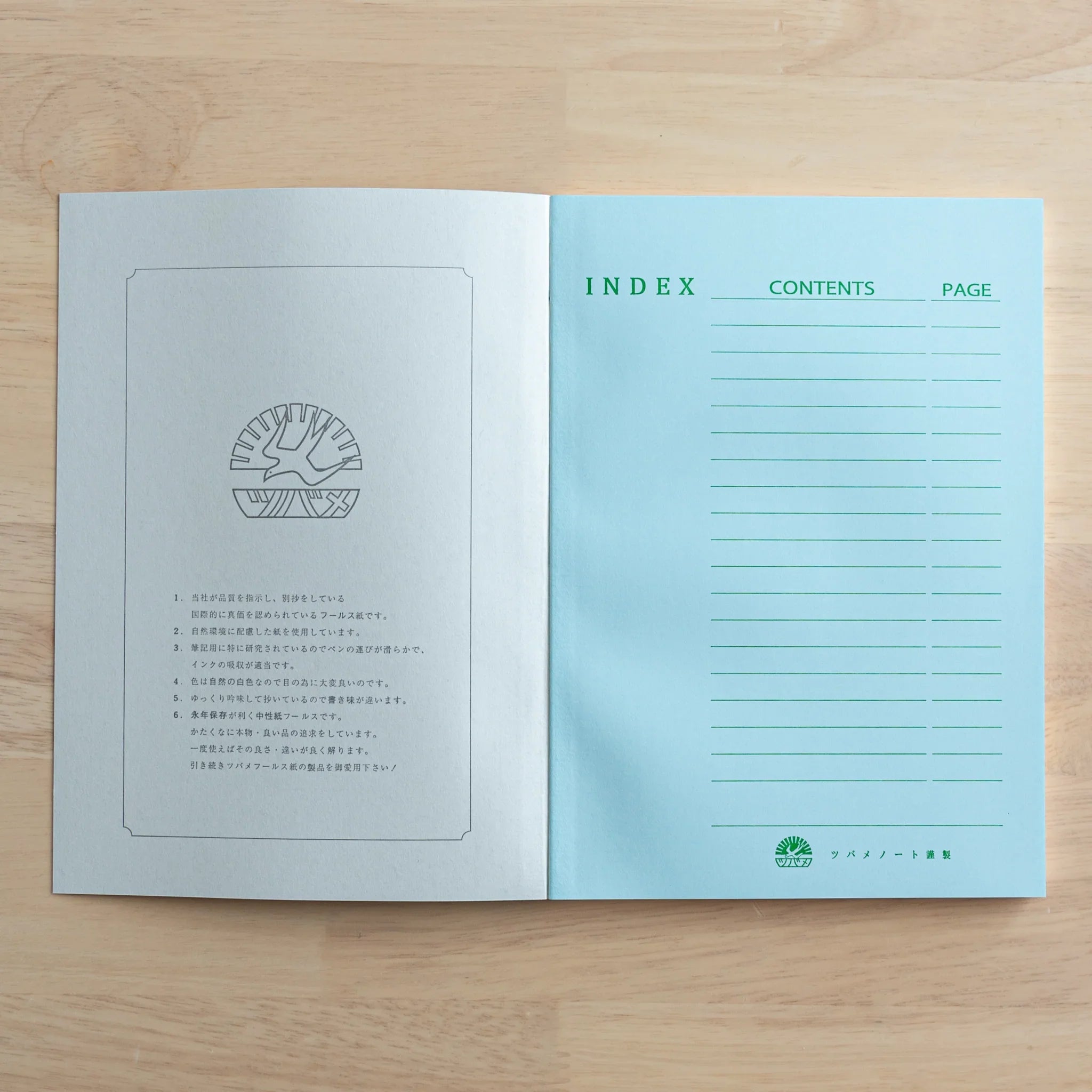Tsubame Fools University Notebook opened showing turquoise Japanese index cover with instruction pages