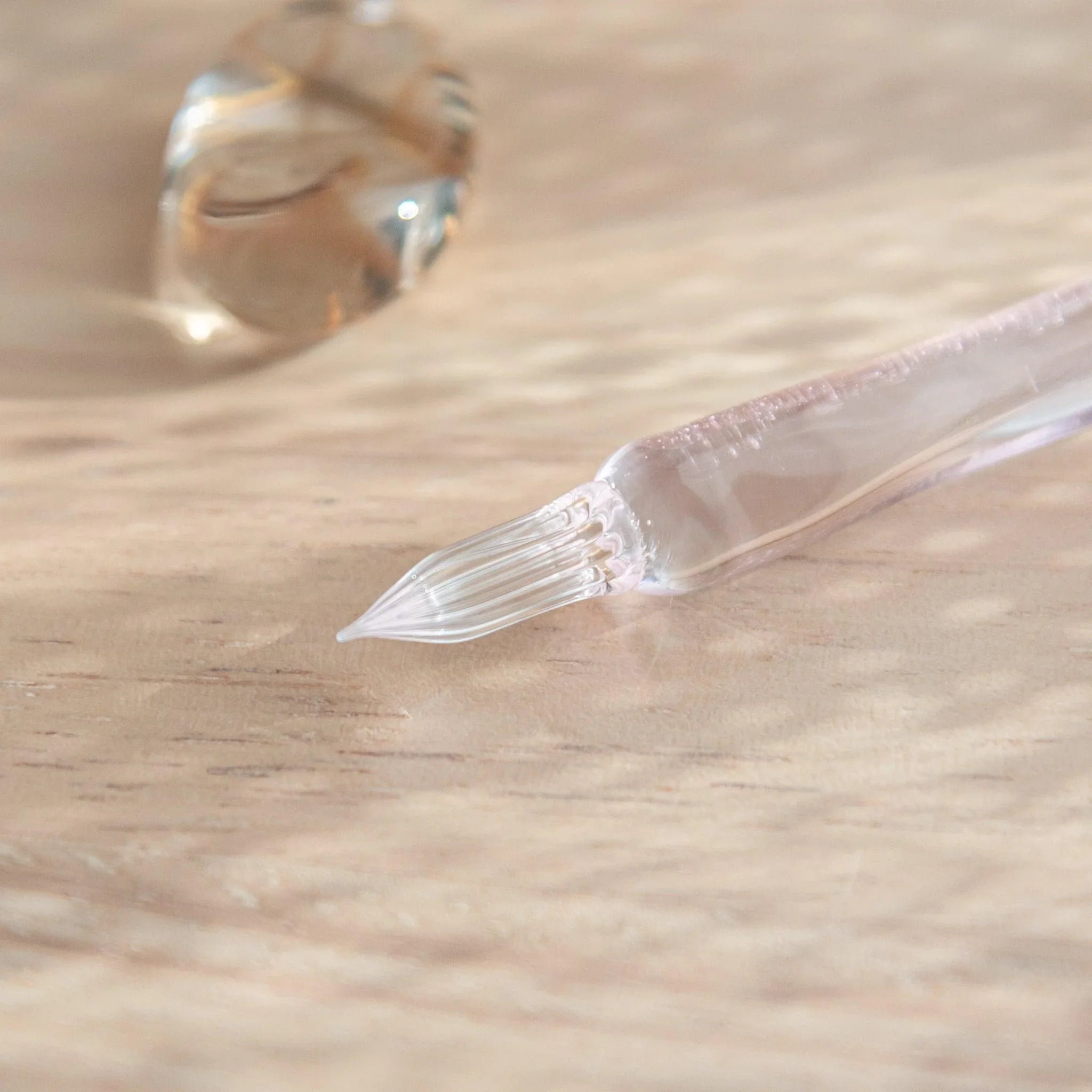 Pink glass dip pen with wish upon a star celestial design featuring stellar and cosmic pattern throughout shown