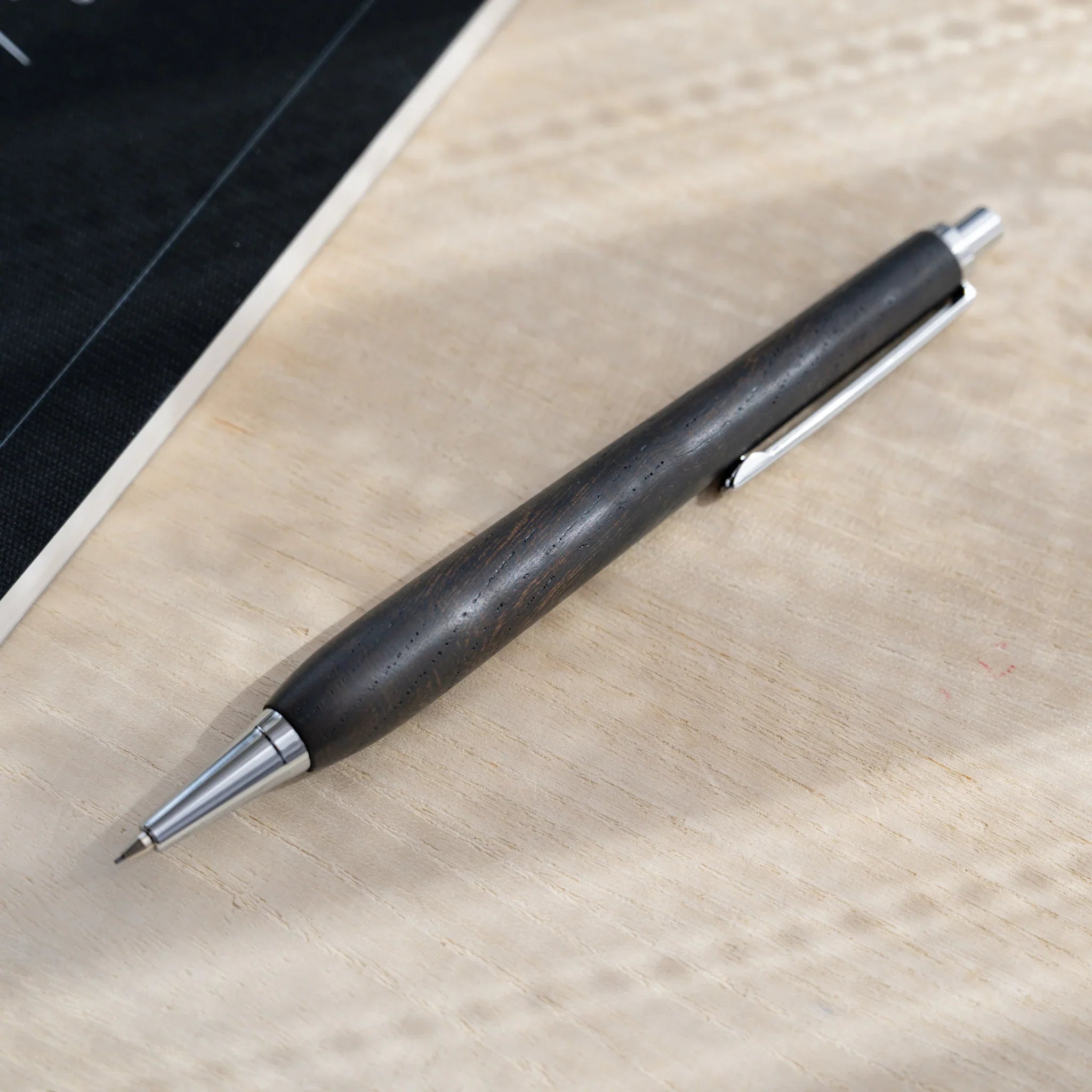 Zelkova wood urushi lacquered mechanical pencil in charcoal black, Japanese keyaki wood, silver knock and clip