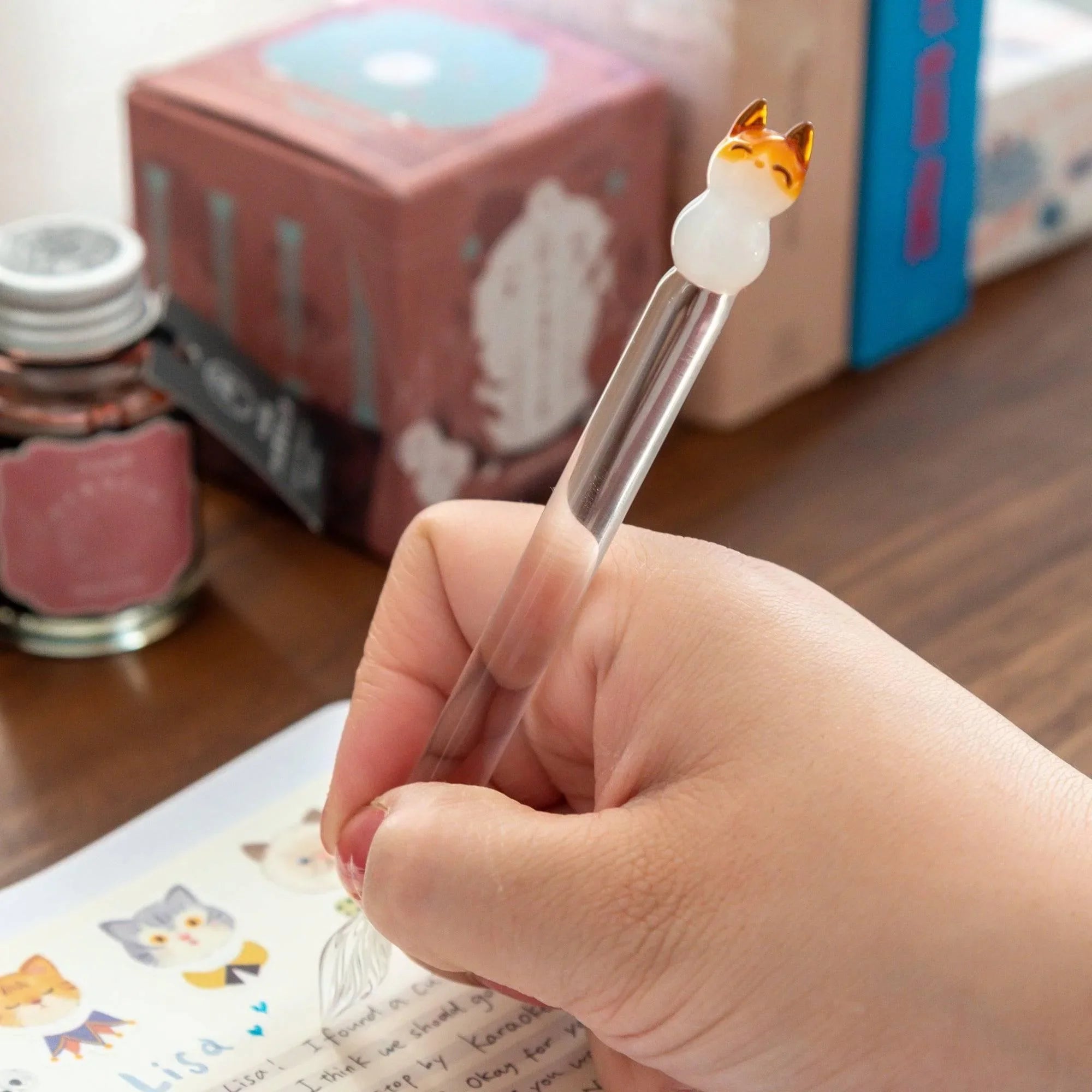 Cat Perch glass dip pen with twisted nib featuring feline silhouettes and smooth transparent glass body with holder