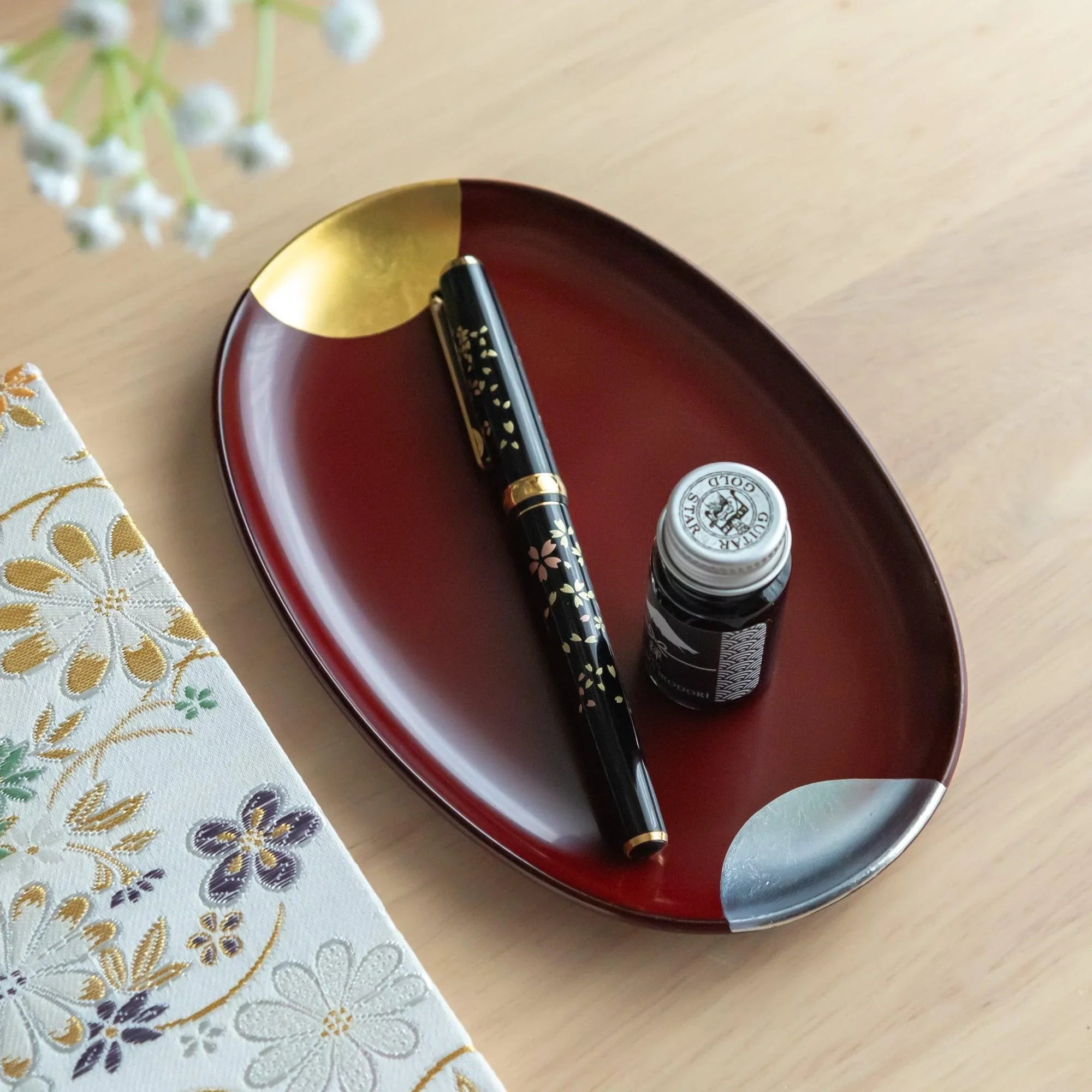 Ancient Red Sun and Moon Echizen lacquer pen tray features red glaze with celestial motif, refined for organizing writing 