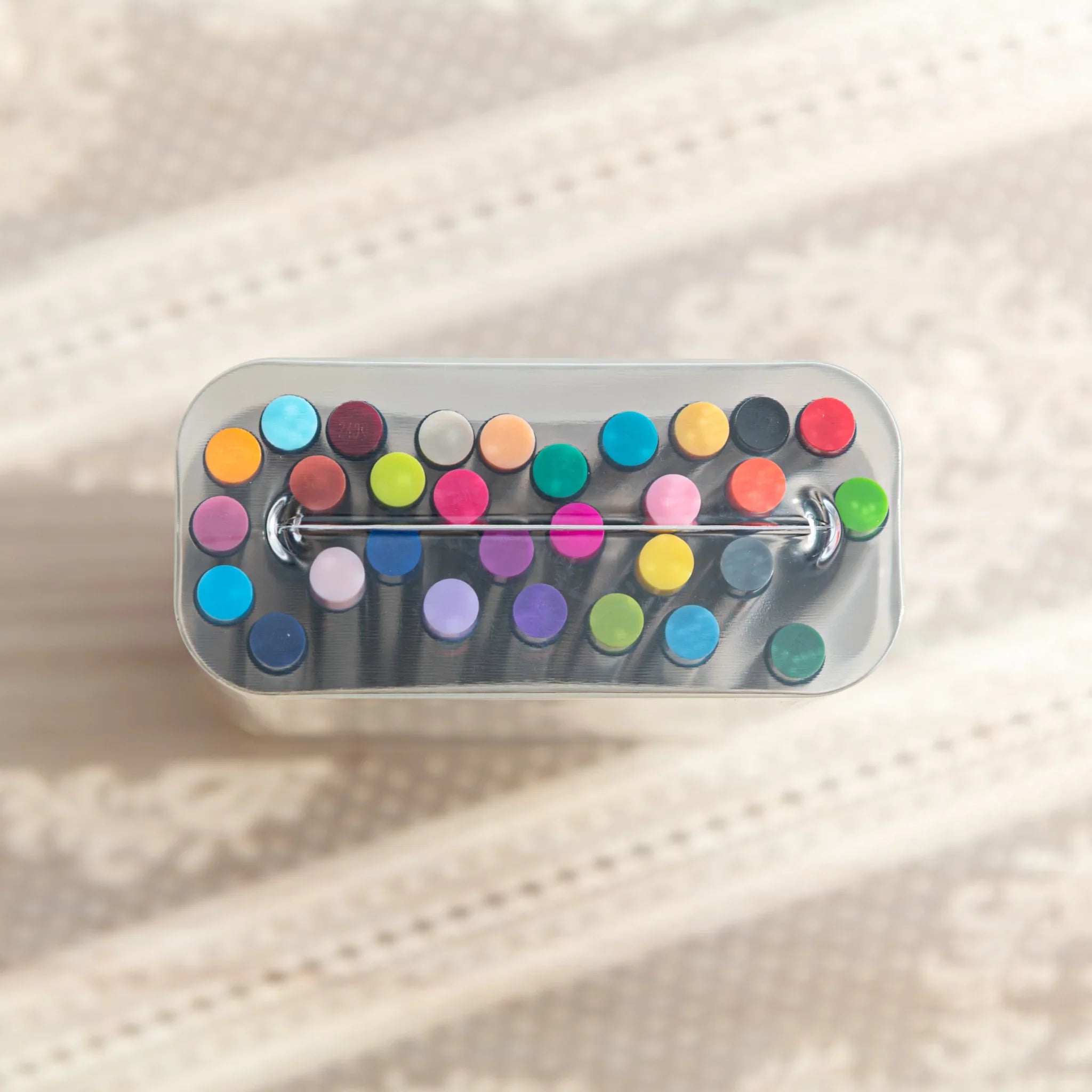 Brush pens organized showing thirty different watercolor colors for comprehensive professional art studio