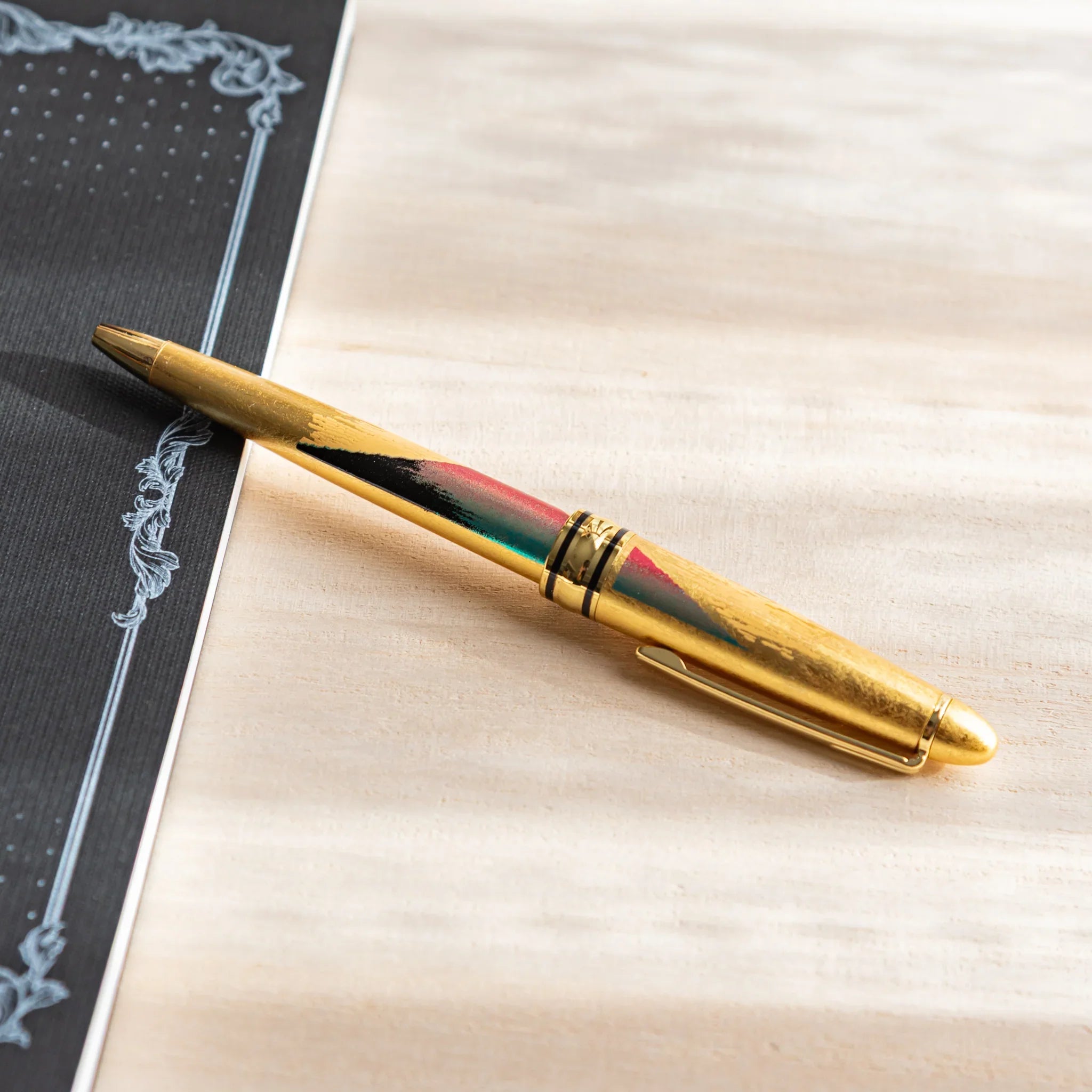 Gold Leaf Mt. Fuji pen detail showing landscape artwork and gold leaf application displayed clearly composition