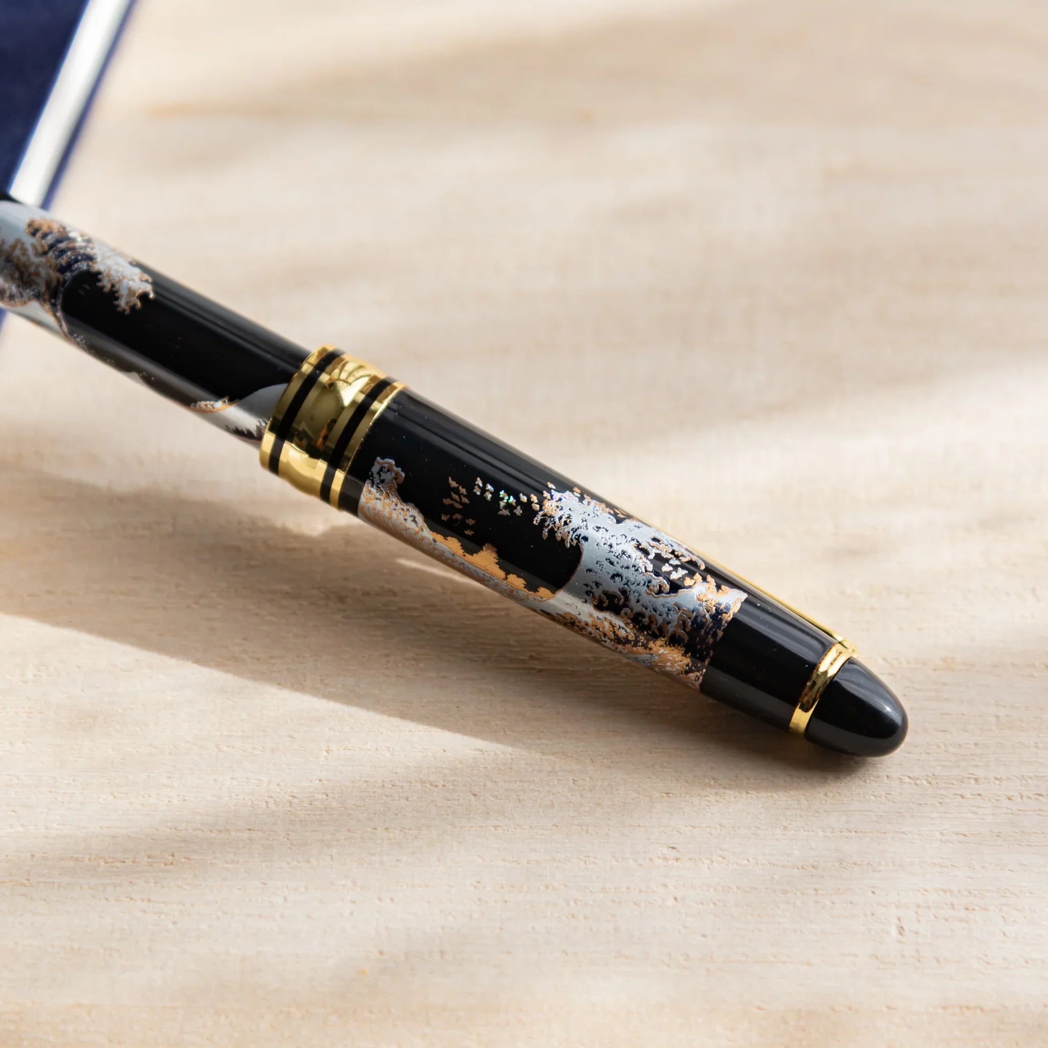 Hokusai Great Wave retractable ballpoint with ornate decoration design shown in composition composition shown
