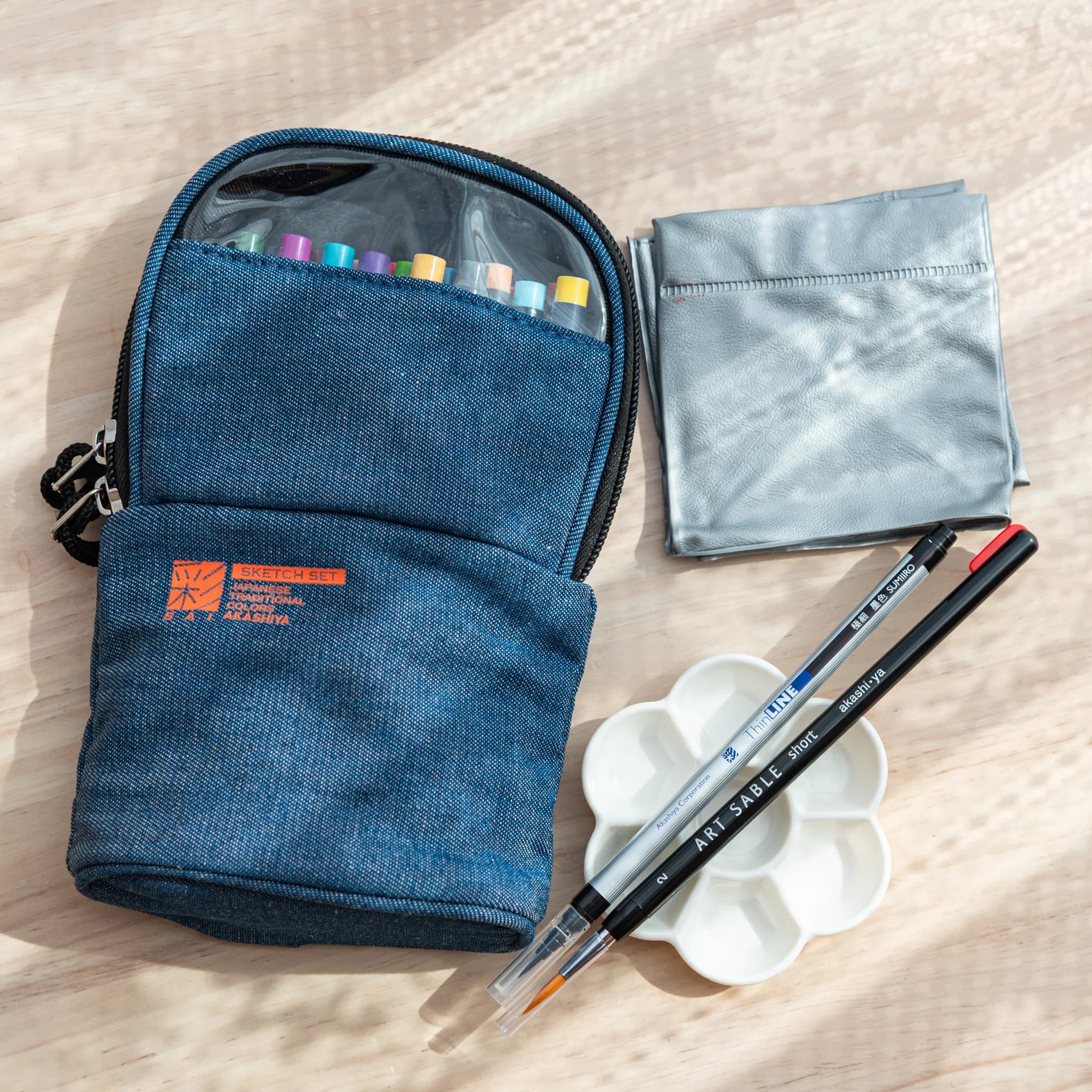 Japanese Akashiya Sai complete watercolor painting kit with folding water cup and blue denim protective case