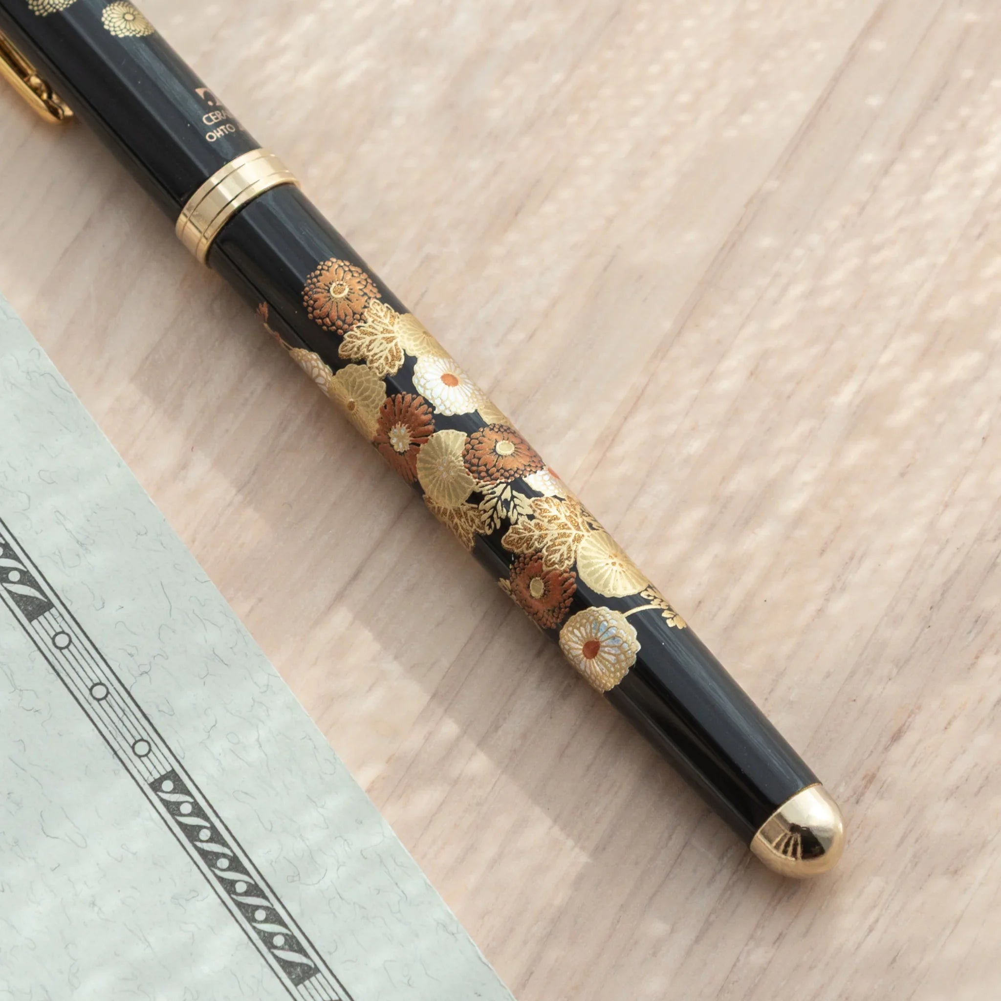 Hand-turned Yamanaka wooden ballpoint pen features red-gold autumn flowers and maple leaves lacquer made