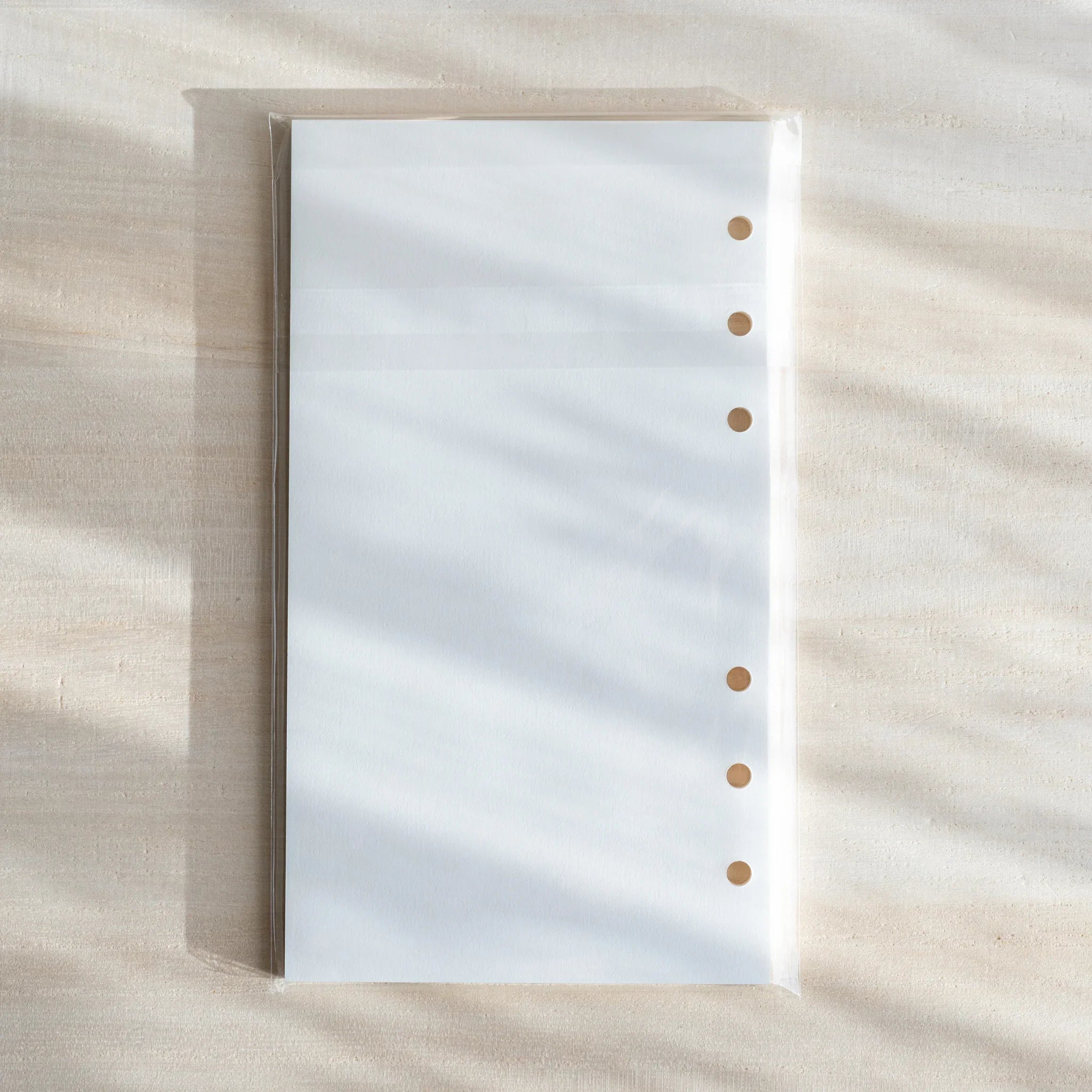 Bank Paper planner refill Bible size showing full pack with cream pages and lines                             