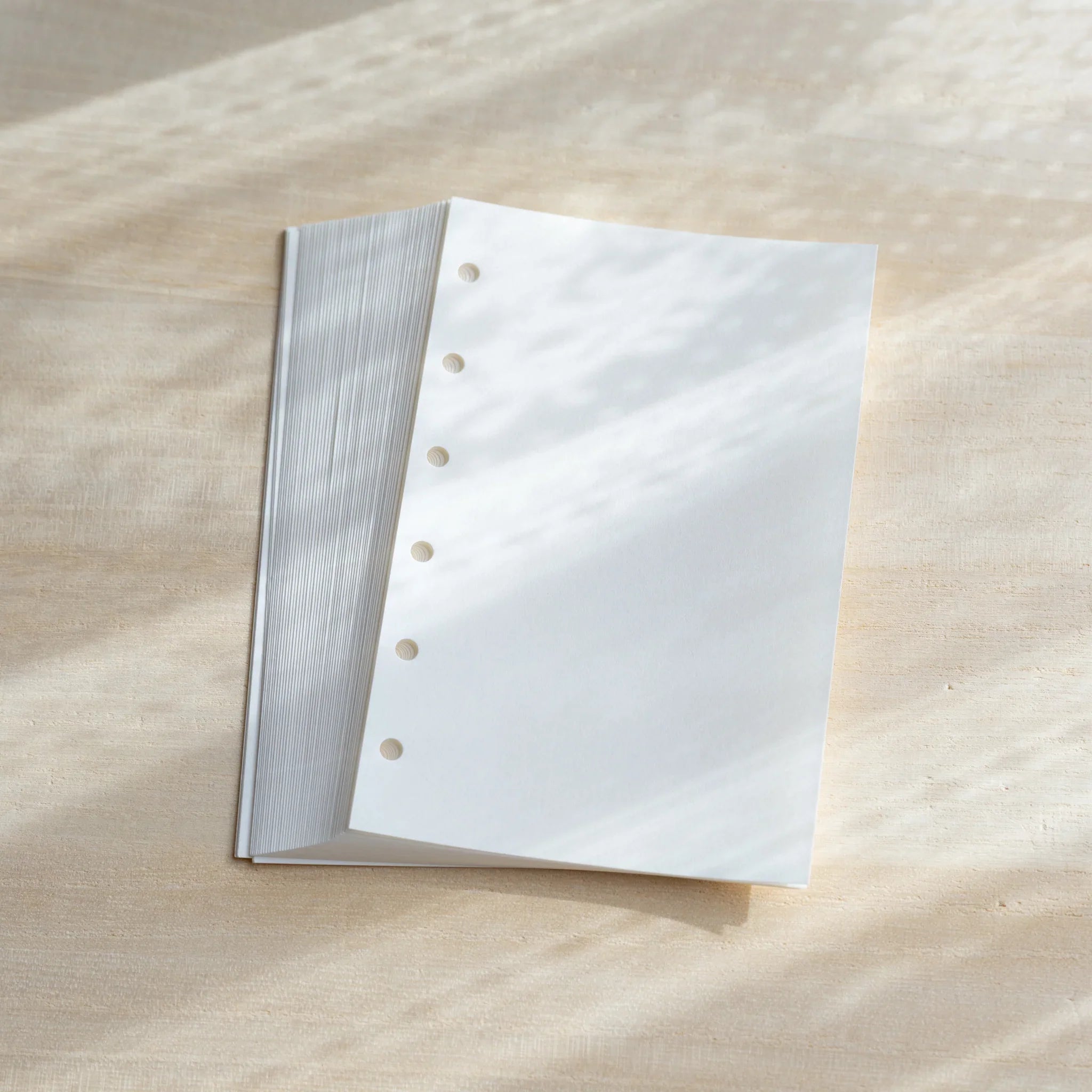 Bank Paper planner refill Mini 6 size displaying full refill pack with cream colored sheets lines             