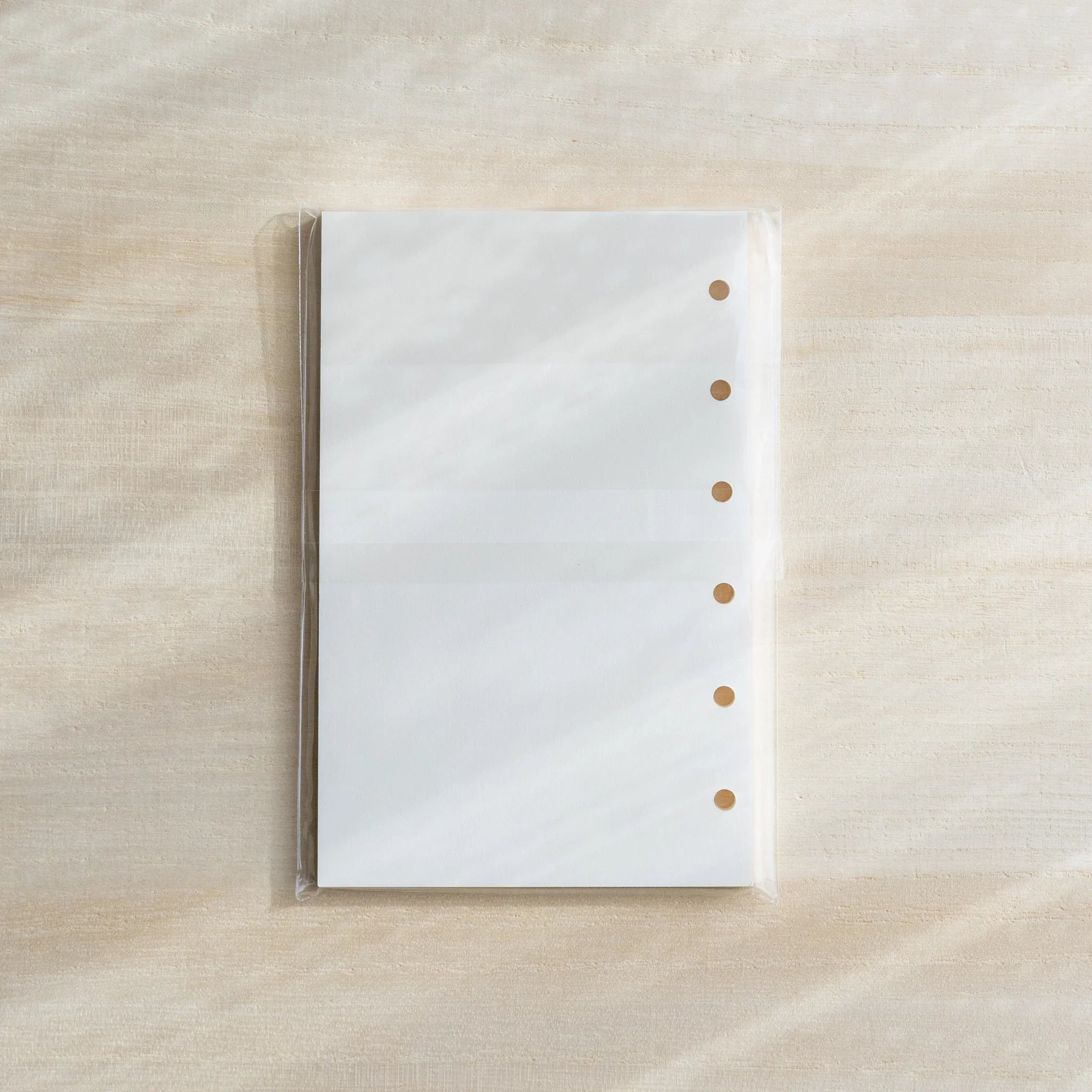 Bank Paper planner refill Mini 6 size displaying cream colored pages with printed lines                       
