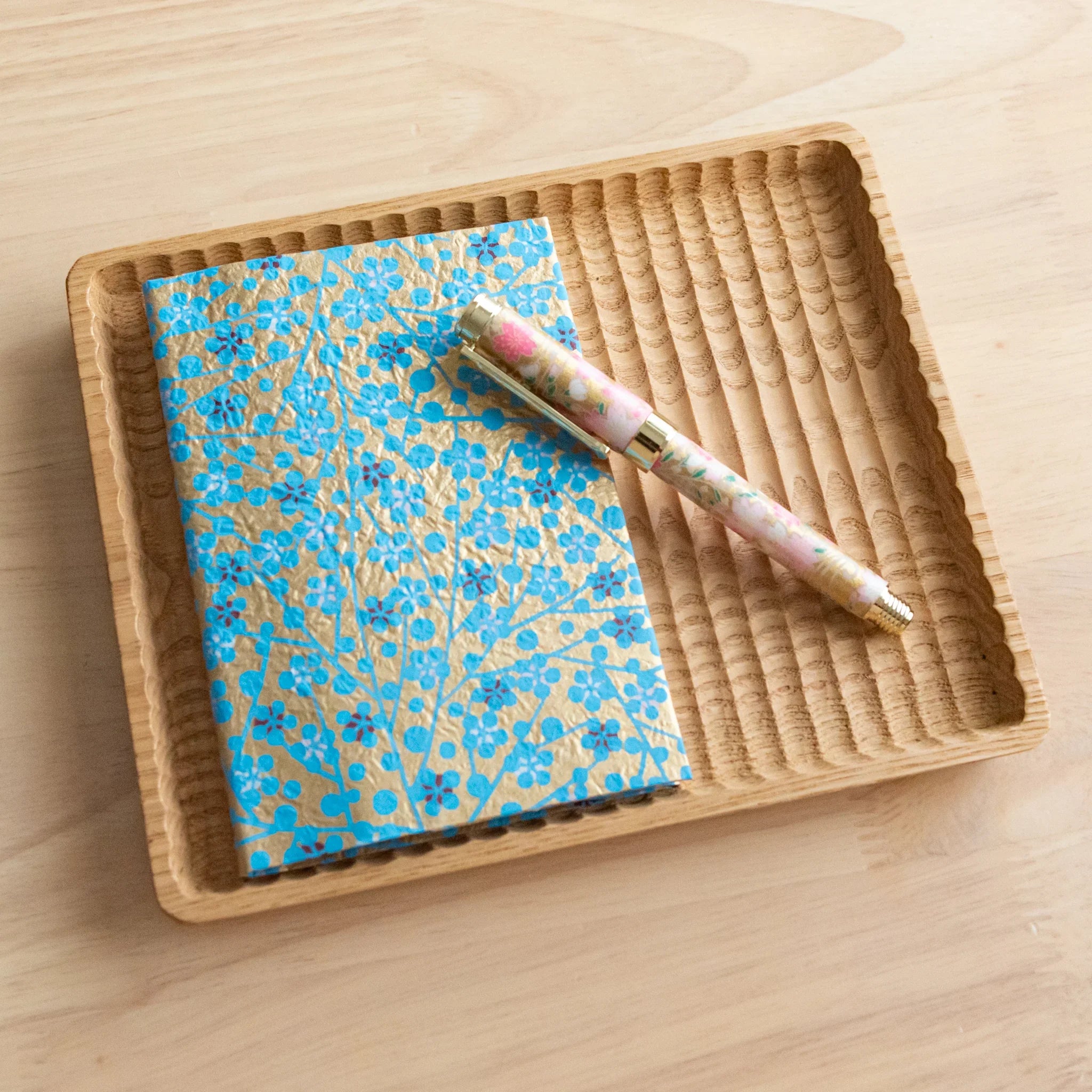 Complete hand-dyed Yuzen washi book cover set featuring blue floral design for protective A6 book size use