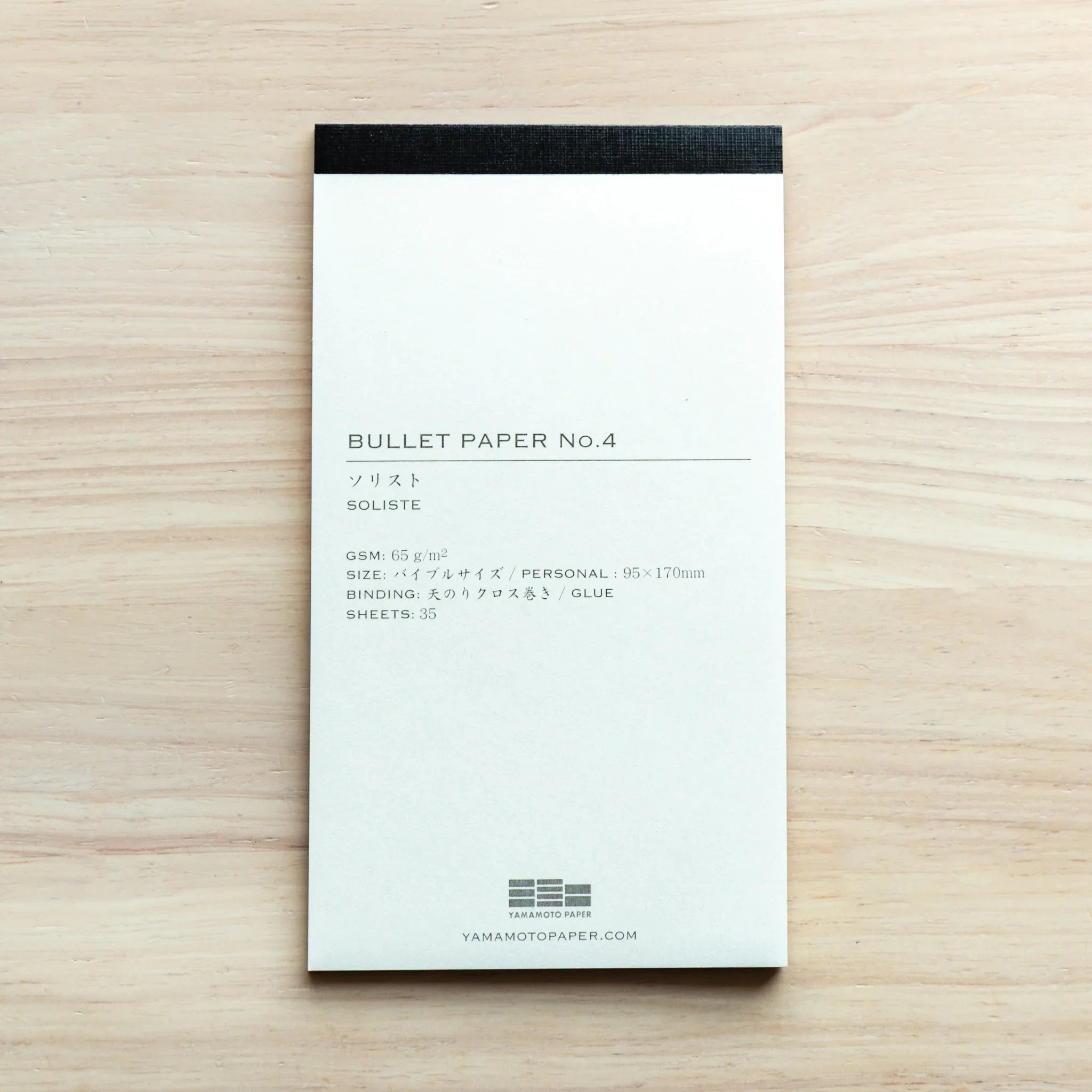 BULLET PAPER No.4 Soliste pad on light wood, back label: 65gsm, Personal 95x170mm, glue binding, 35 sheets, Yamamoto Paper