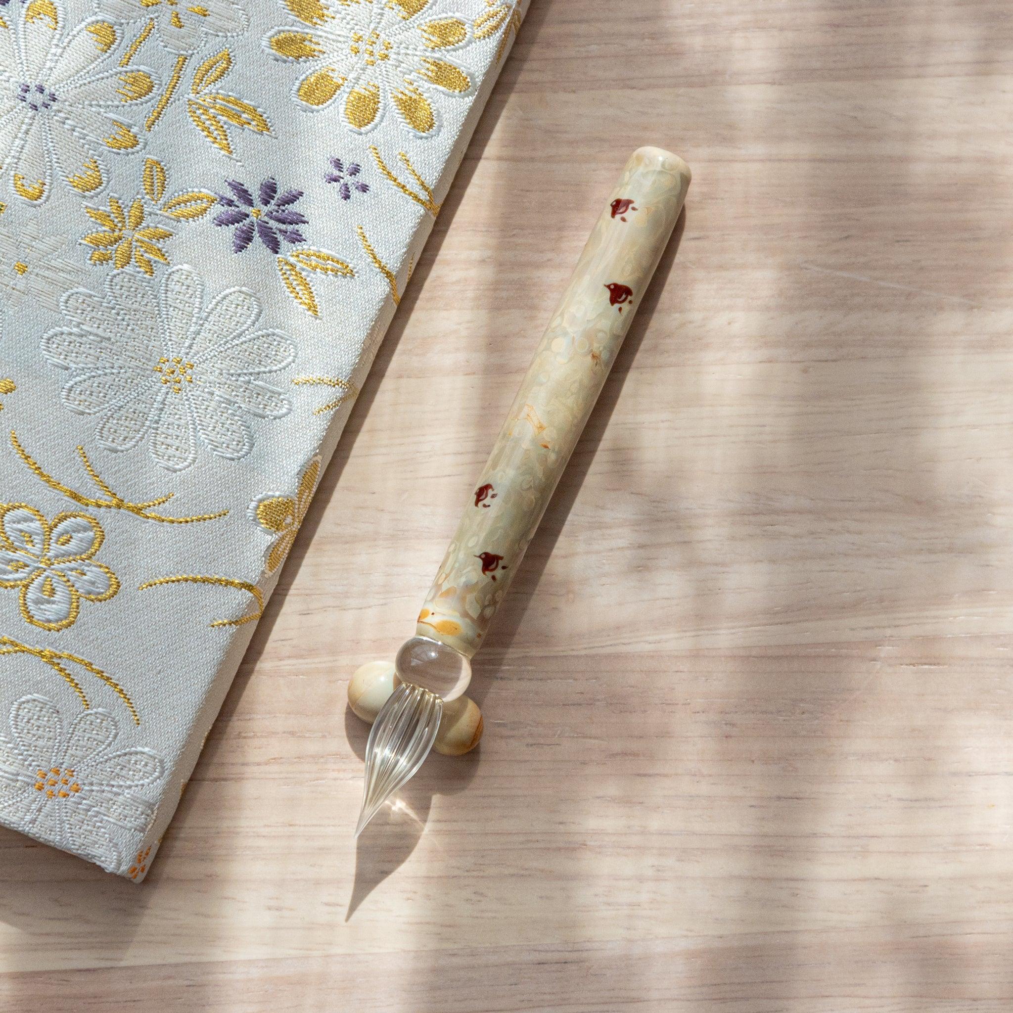 Chidori ivory glass dip pen with pen rest featuring chidori duck pattern, clear glass with ivory-toned elements