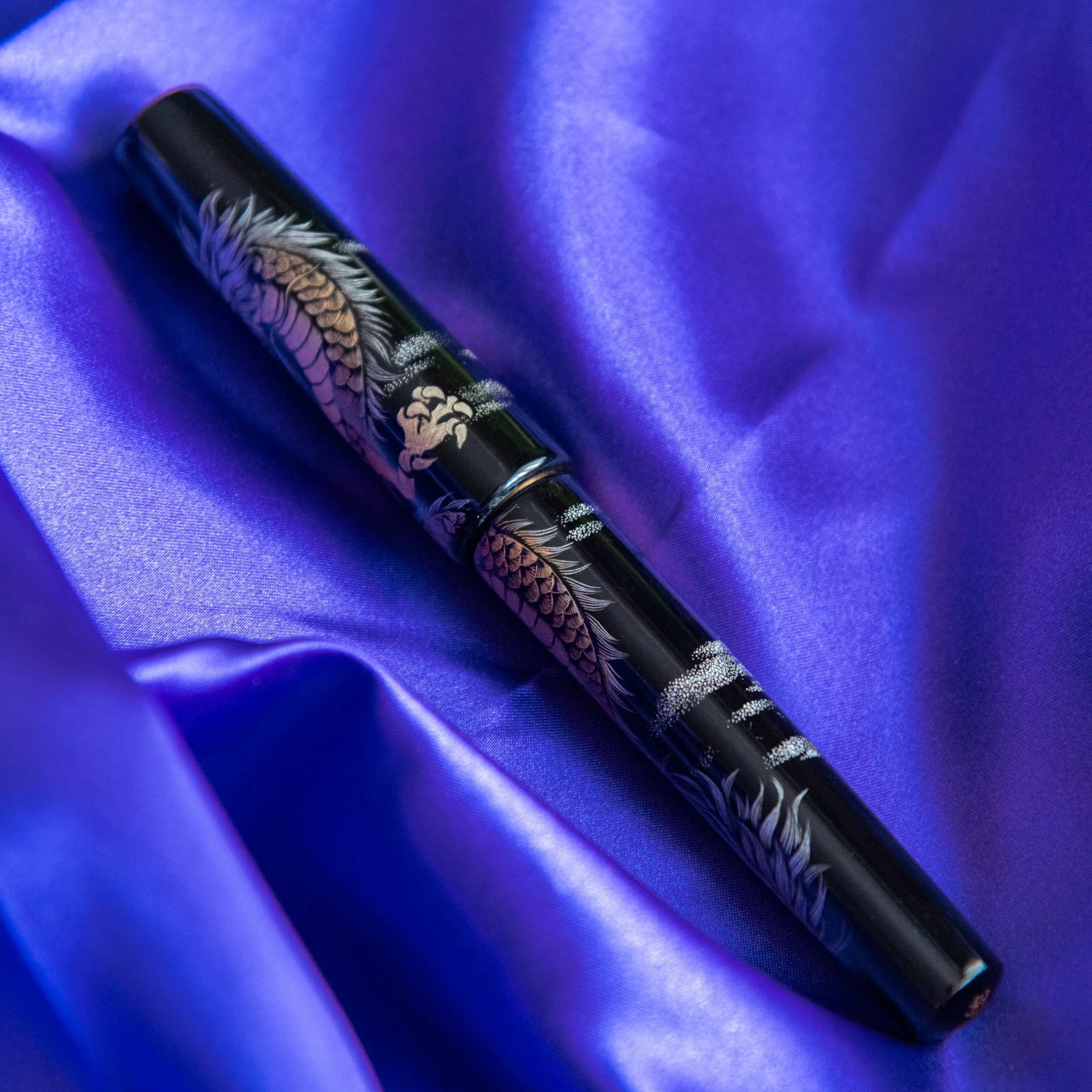 Chinkin Dragon fountain pen displayed standing upright showing profile and lacquer finish showing product quality and desi