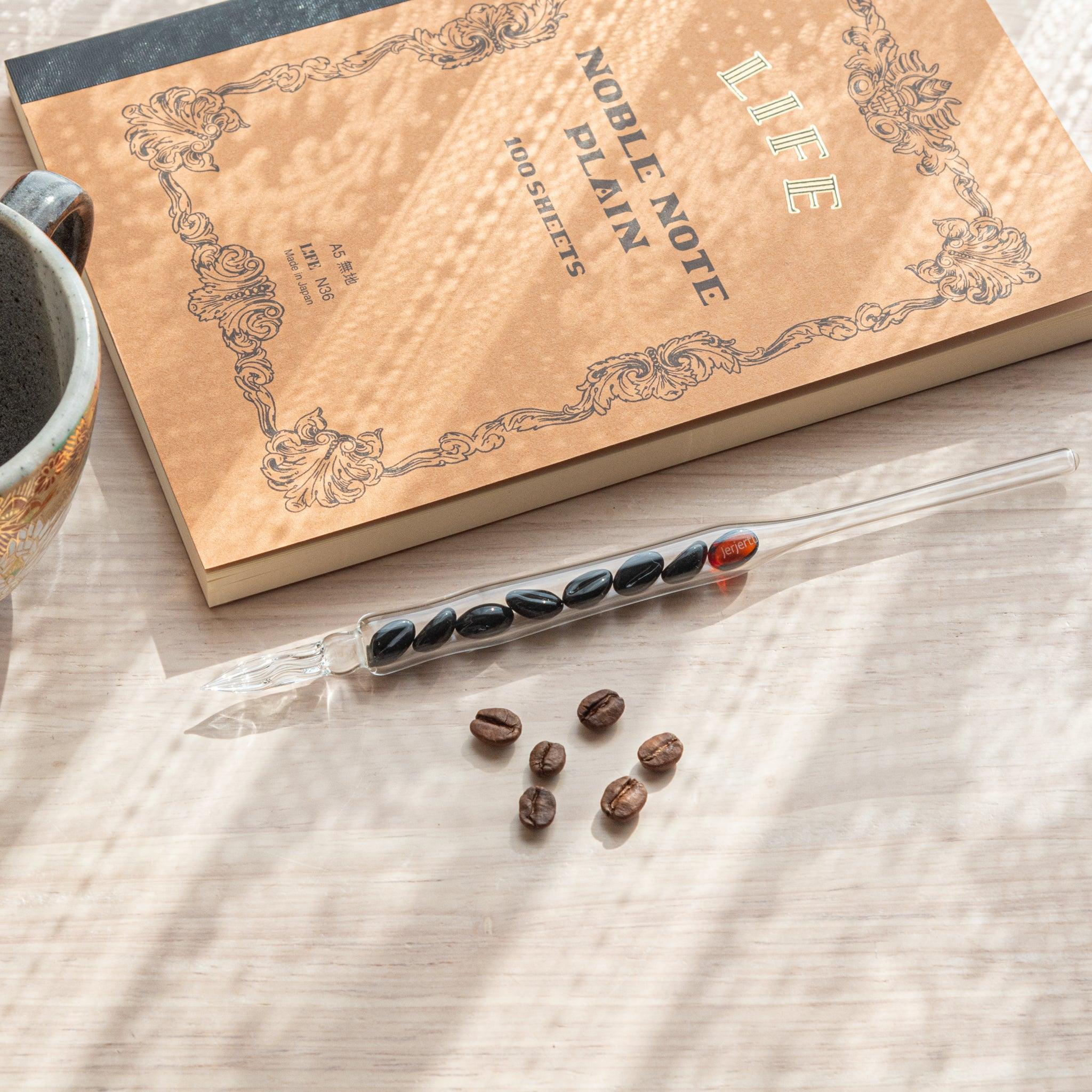 City Roast Coffee Beans Glass Dip Pen full view with transparent glass barrel showcasing brown coffee bean motif design