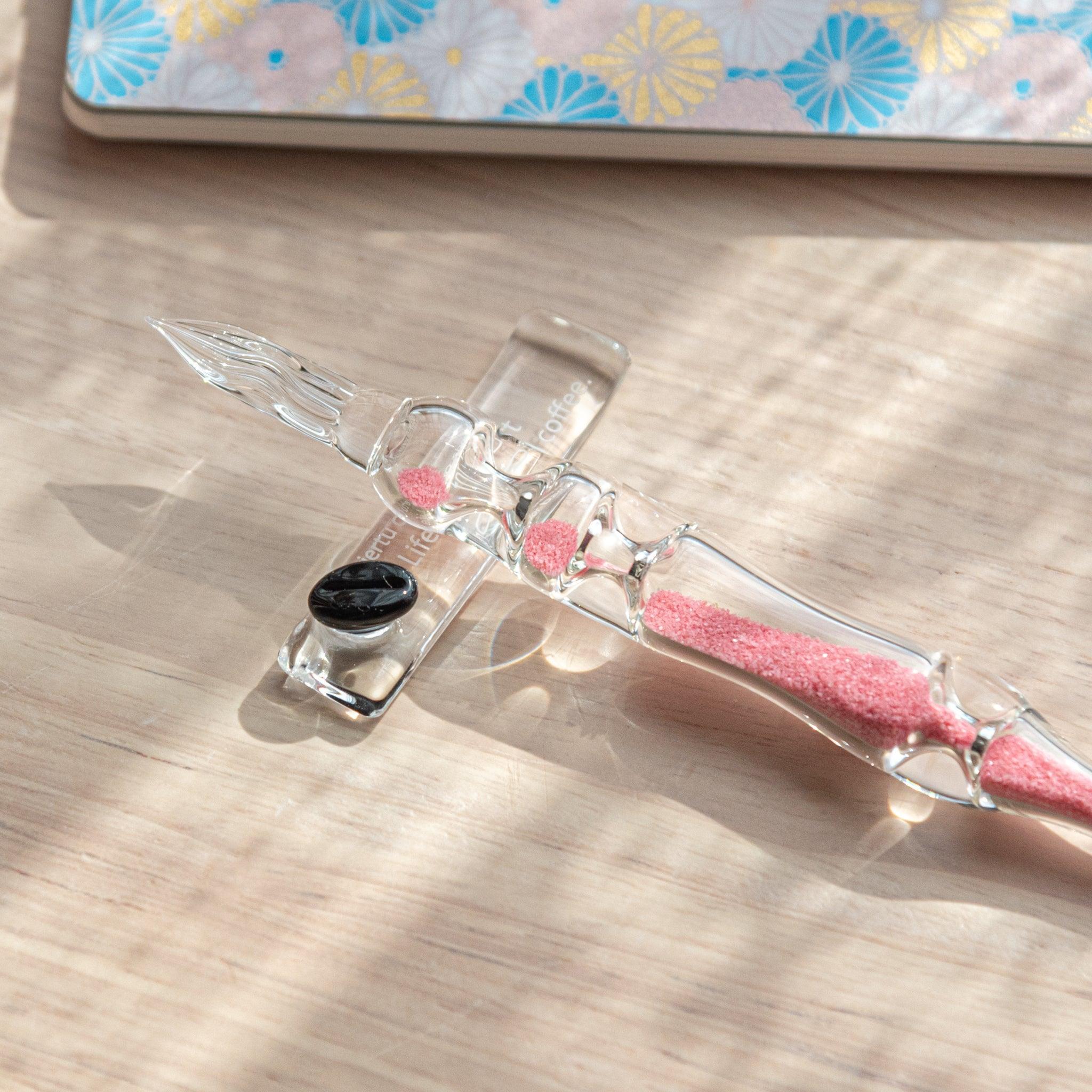 Coffee Bean Glass Pen Rest side angle view showing coffee bean design wrapping around complete transparent glass rest