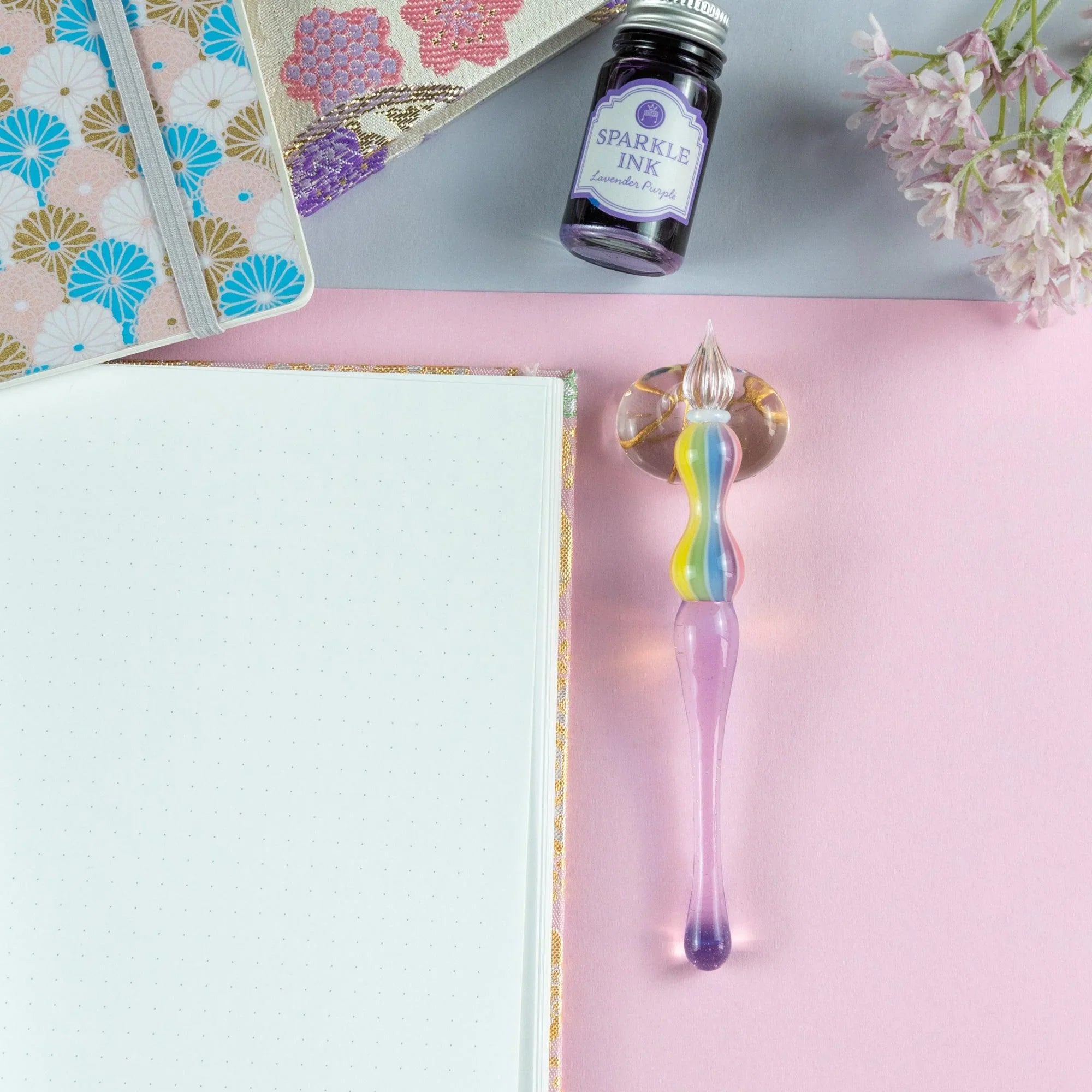Rose colored glass dip pen with rainbow gradient from pale pink to deeper rose tones in balloon design