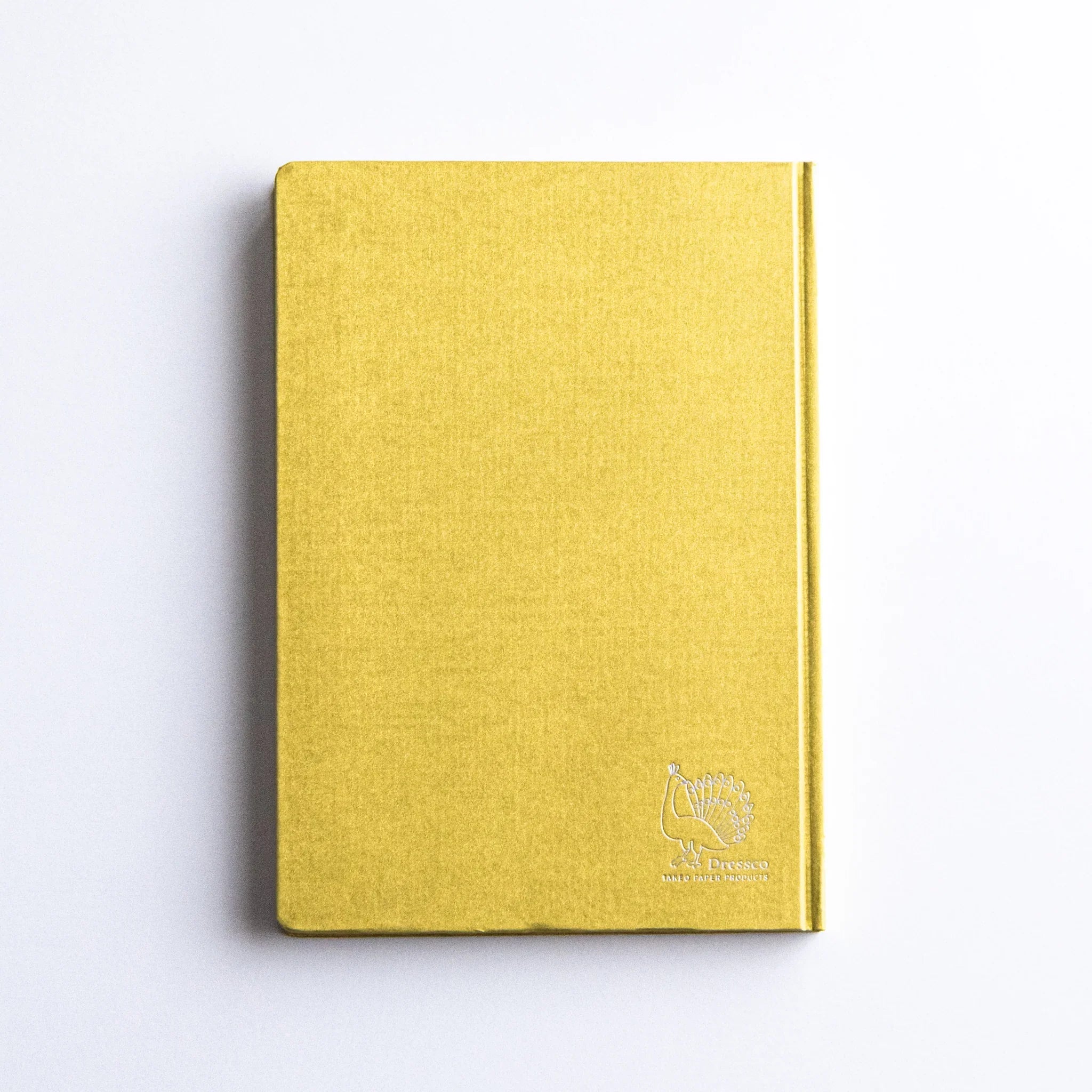 Dressco Bank Ledger Paper A6 notebook positioned upright showing the front face and book height from front view