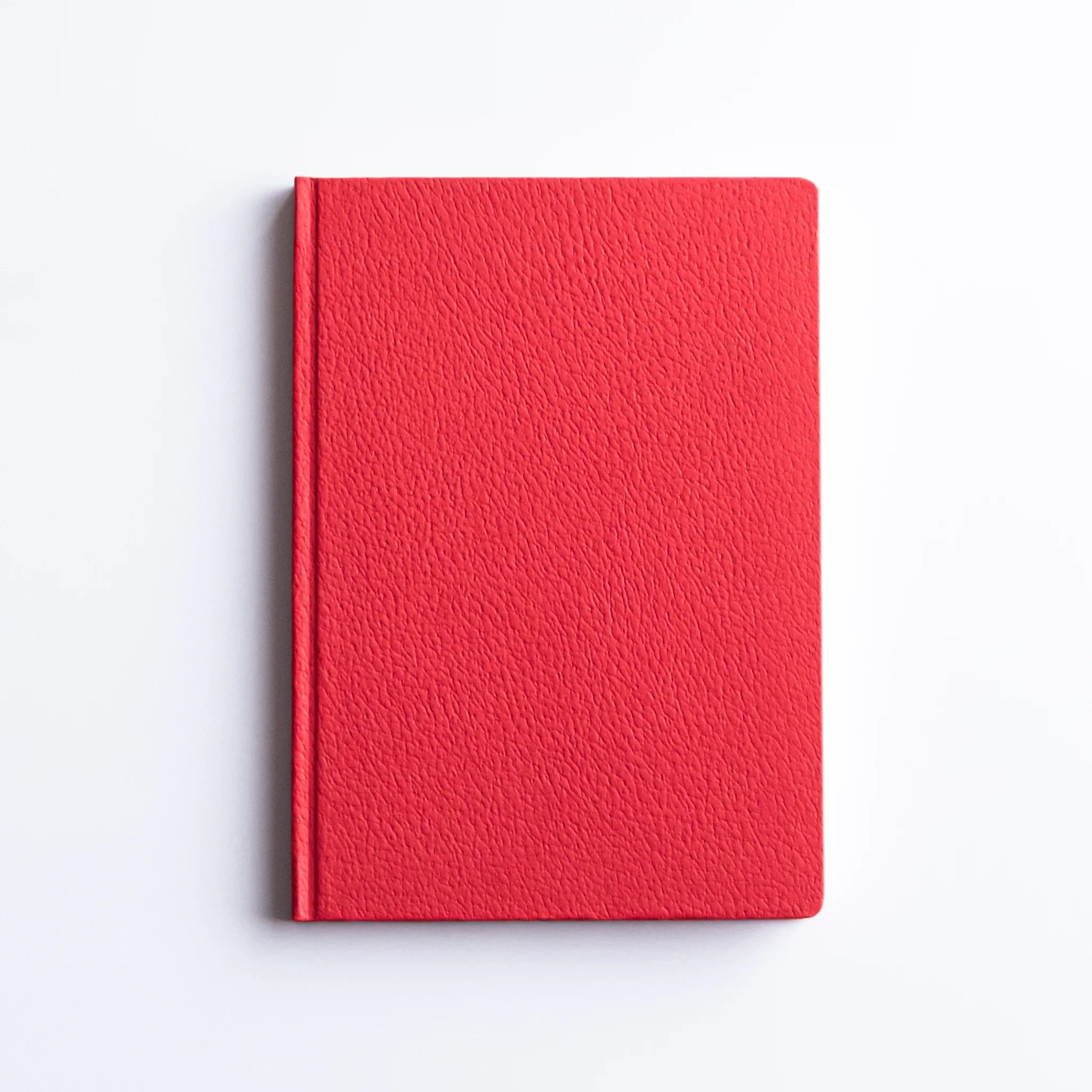 Dressco Bank Ledger Paper A6 notebook cover surface shown in detail revealing the cover material texture and edges