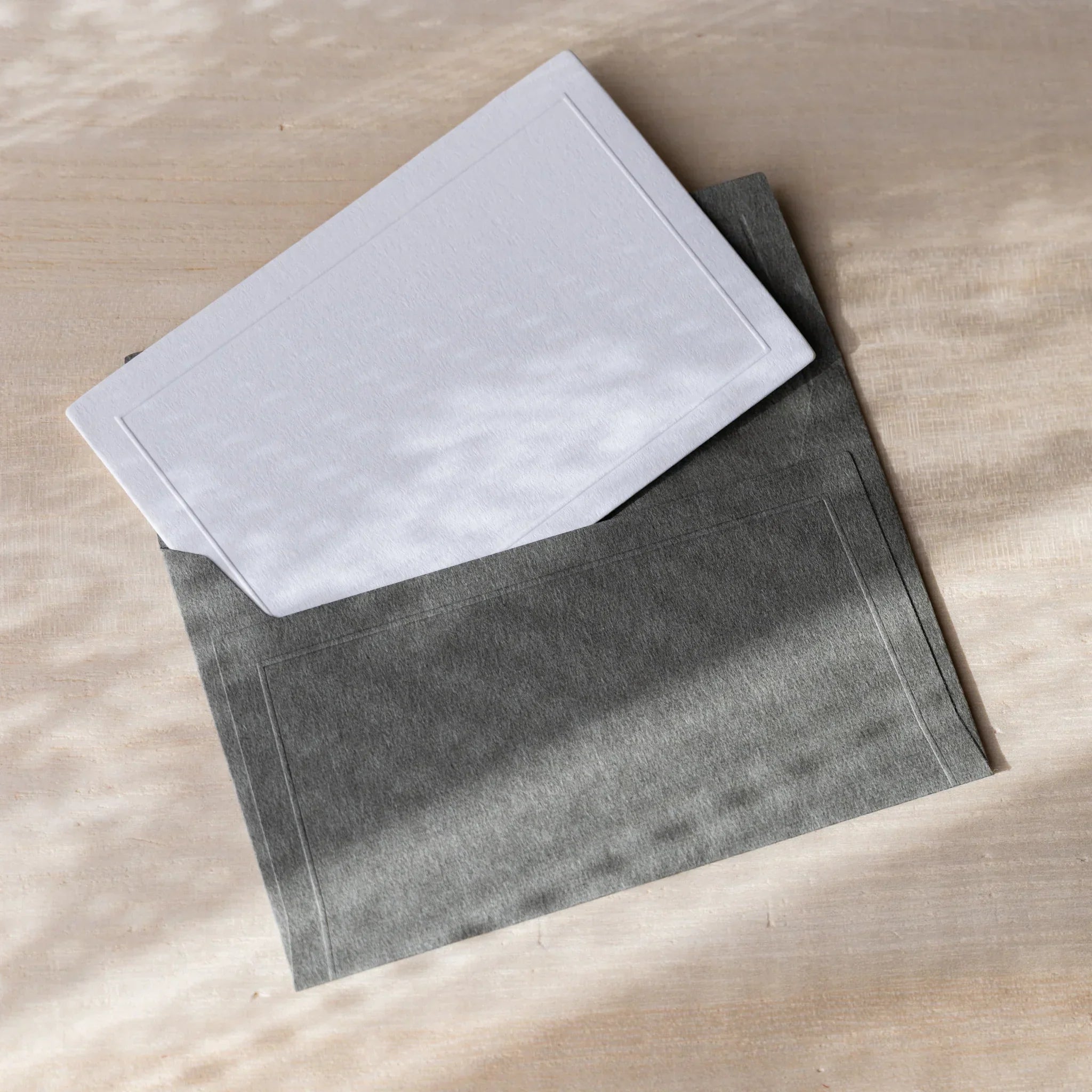 Dressco embossed envelope, multiple colored shade, close-up showing raised design                             
