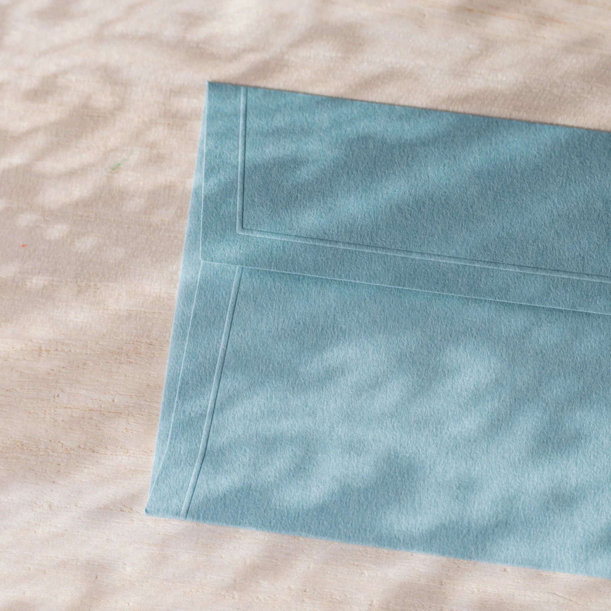 Dressco small embossed envelope set, sage green shade, product shot showing with                              