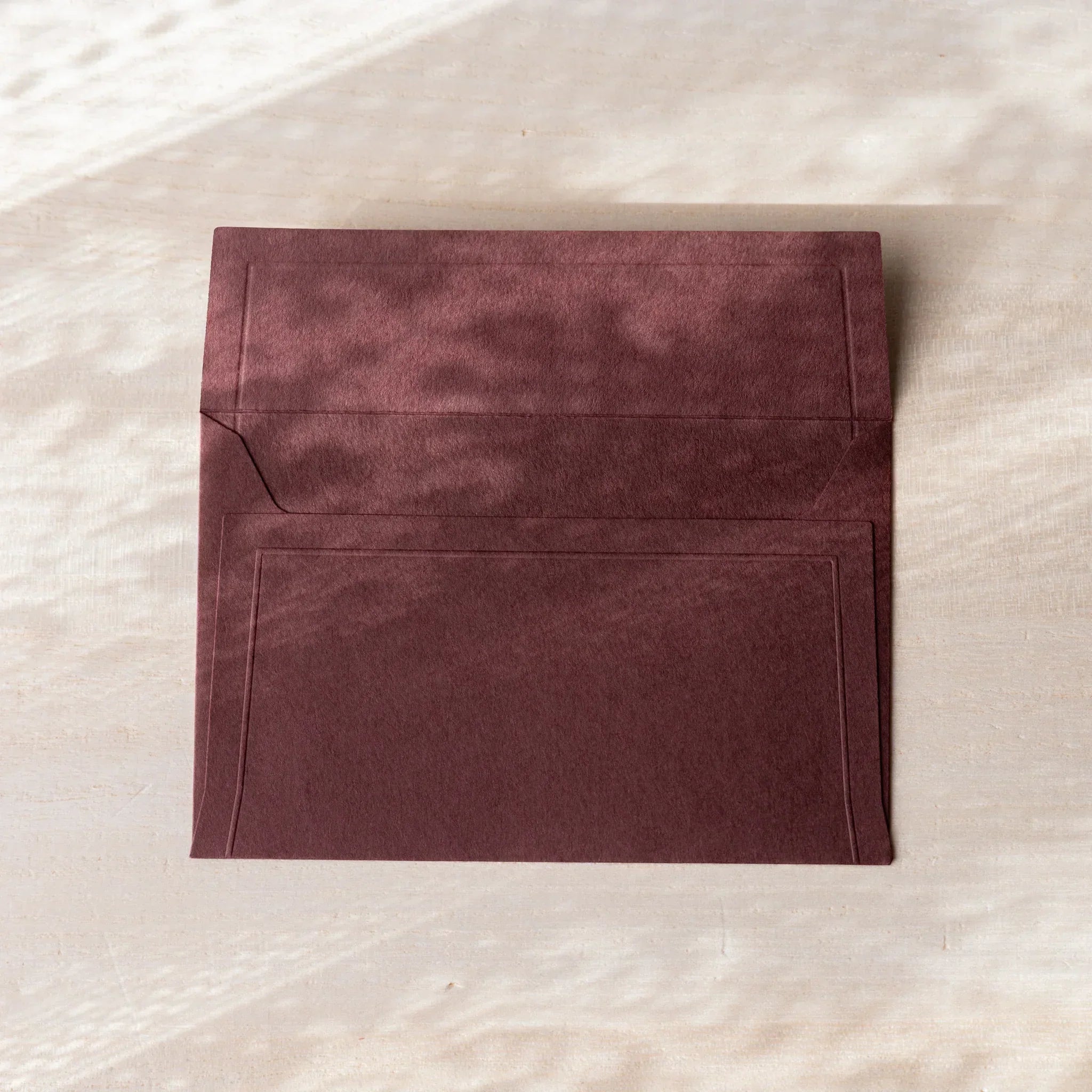 Dressco small envelope set, soft toned, isolated view highlighting embossing                                  