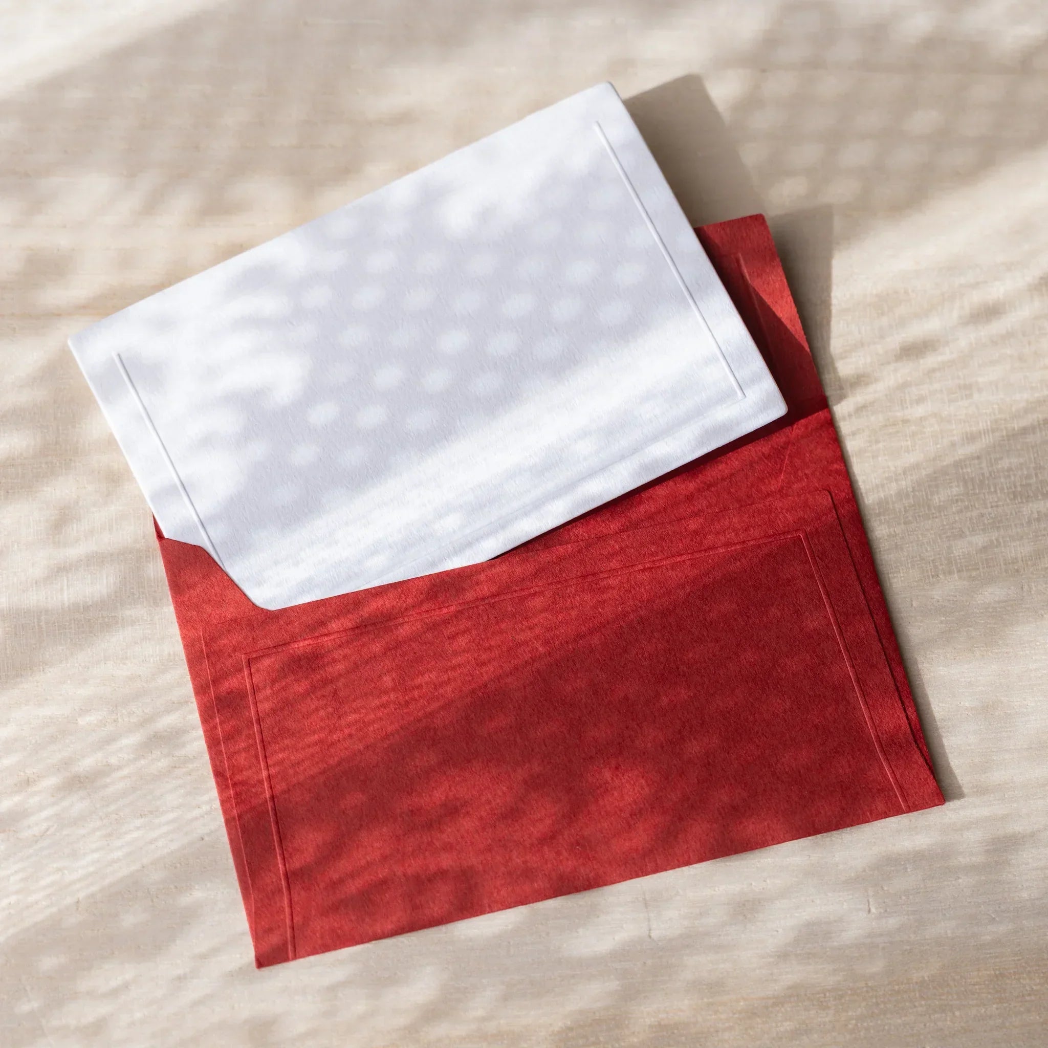 Dressco small envelope, yellow, close-up display of embossed pattern design                                   