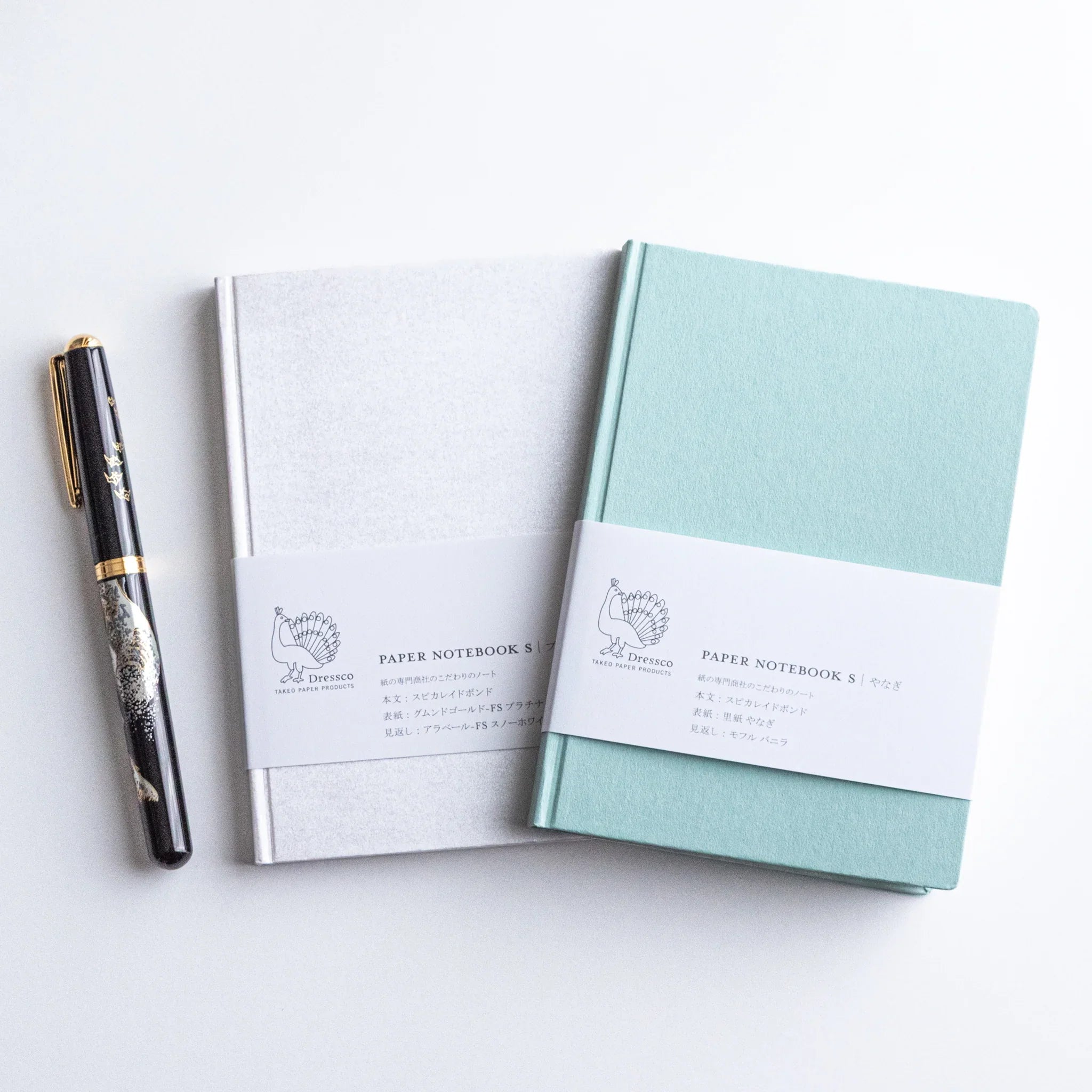 Dressco Spica Laid Bond Paper A6 notebook side profile view showing spine thickness and page count of Japanese notebook