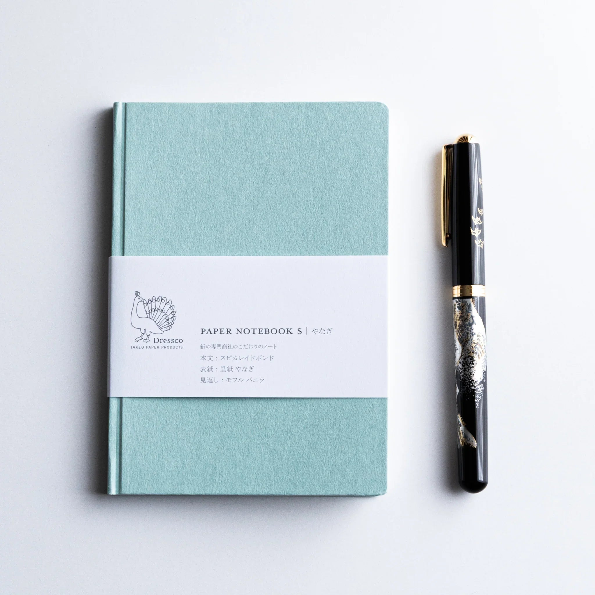 Back cover view of Dressco Spica Laid Bond Paper A6 notebook showing the paper cover and Japanese notebook construction