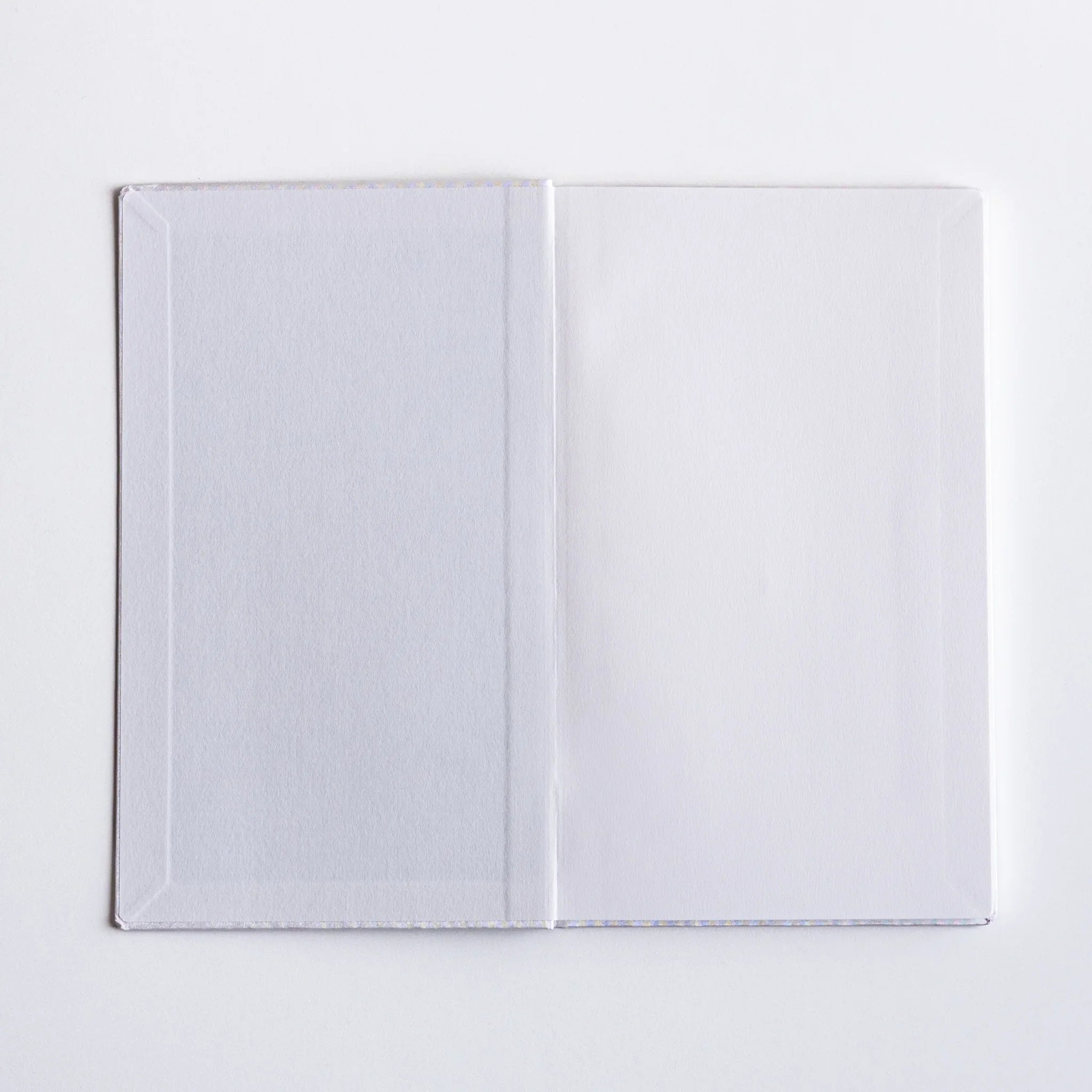 Dressco Spica Laid Bond Paper B6 notebook second variant positioned upright showing cover design and thickness