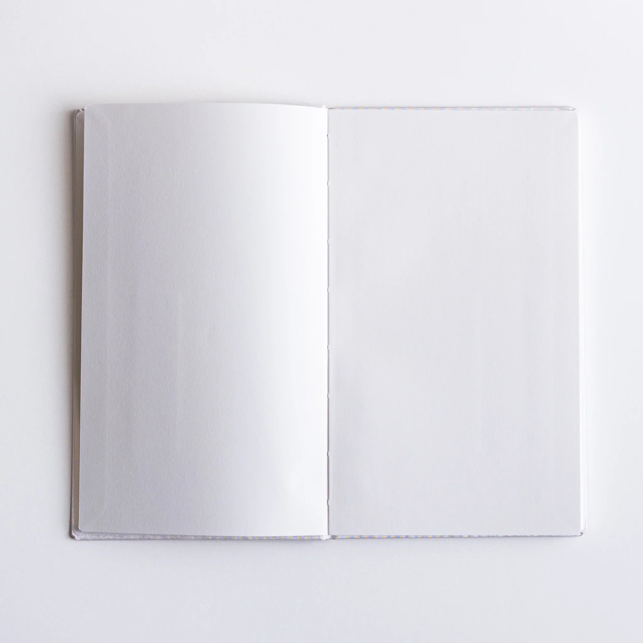 Surface texture of Dressco Spica Laid Bond Paper B6 notebook second variant showing the laid paper grain in detail