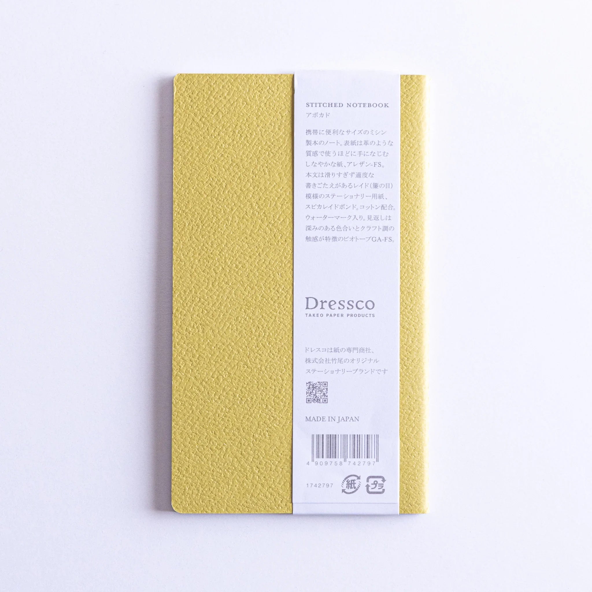 Spine and edge view of Dressco Spica Laid Bond Stitched A6 notebook showing the saddle stitching and page edges
