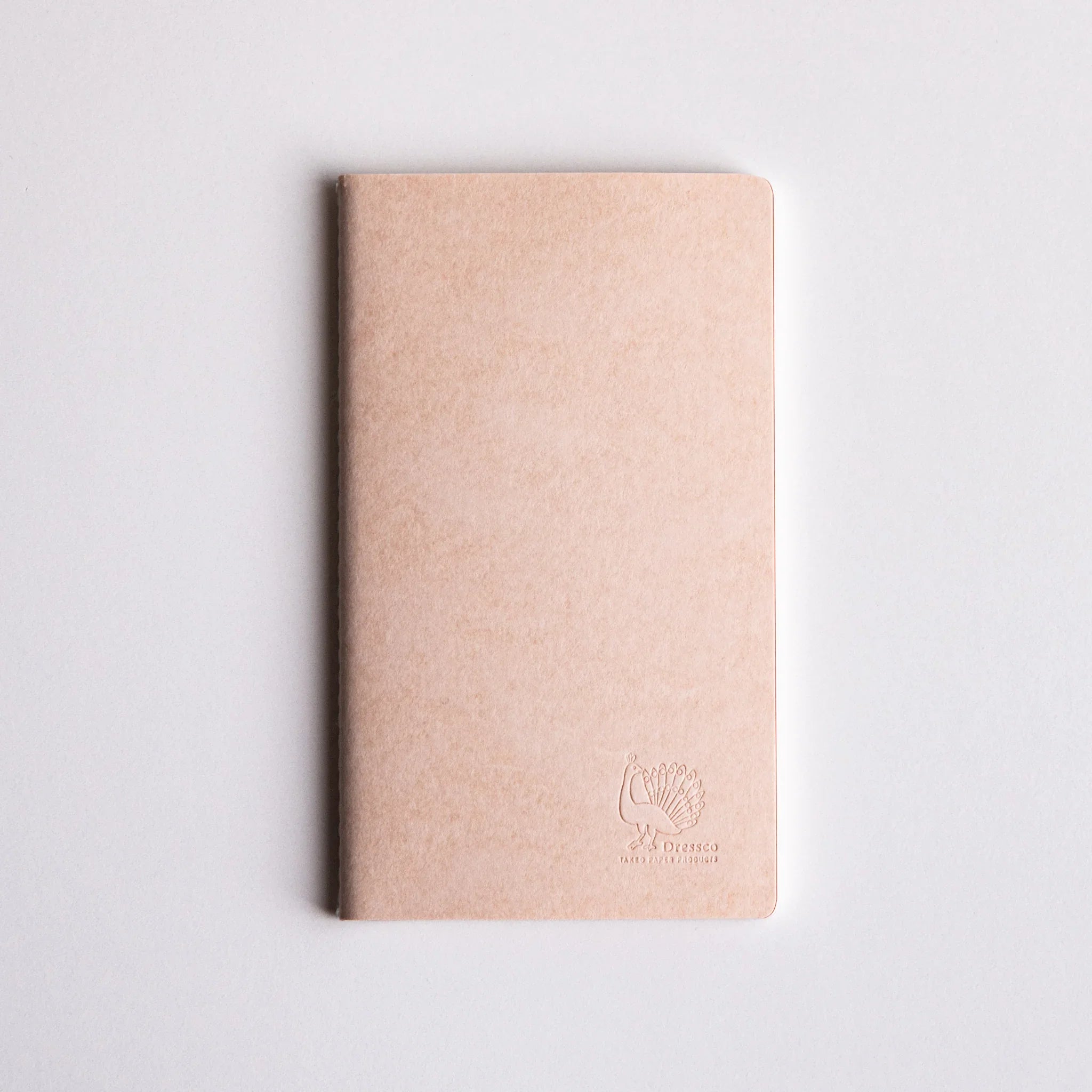 Dressco notebook with pencil and pen positioned ready for writing for writing and personal correspondence use