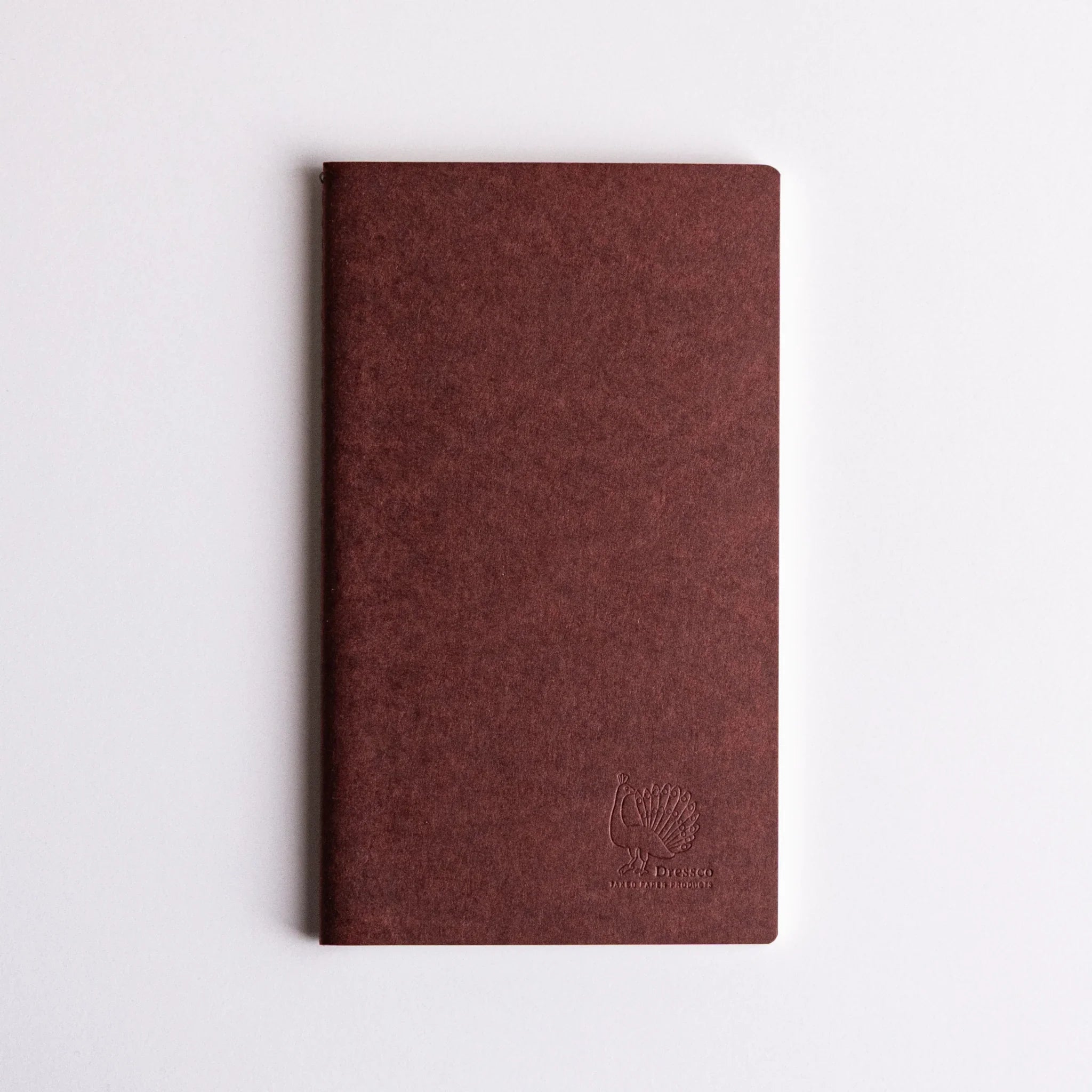 Stack of all three Dressco notebooks showing complete set and coordination for writing and personal correspondence use