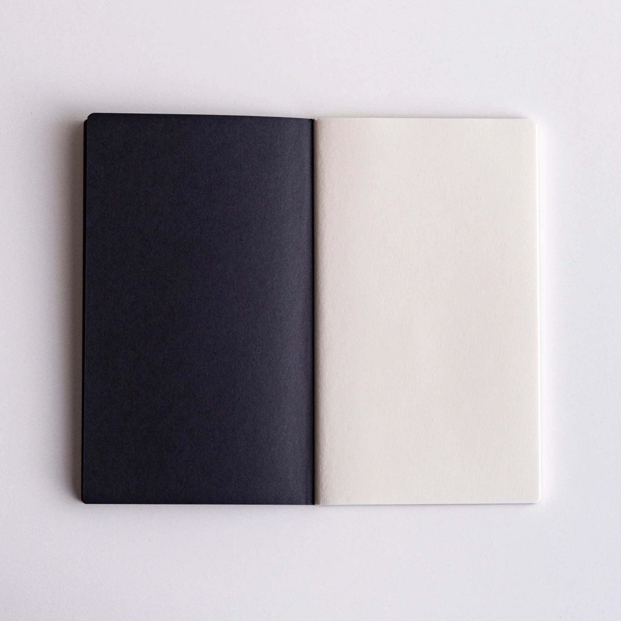 Three notebooks arranged showing style consistency and coordinated design showing product quality and design details