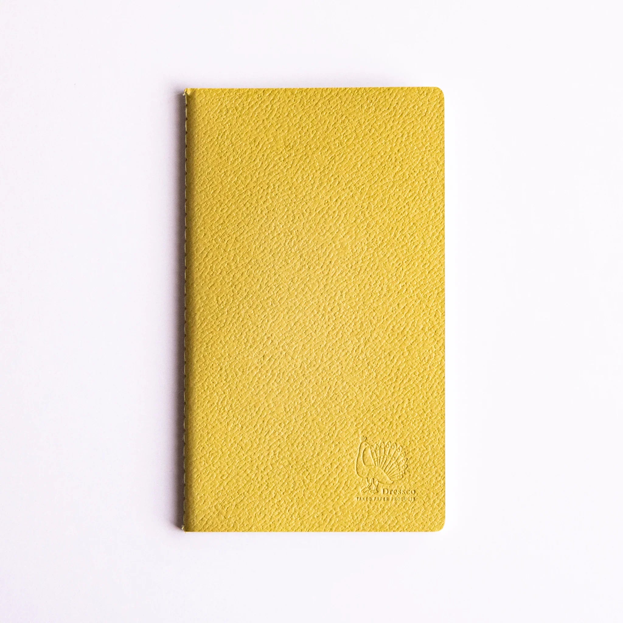 Dressco notebook collection with case, four notebooks with angled view highlighting embossed design           