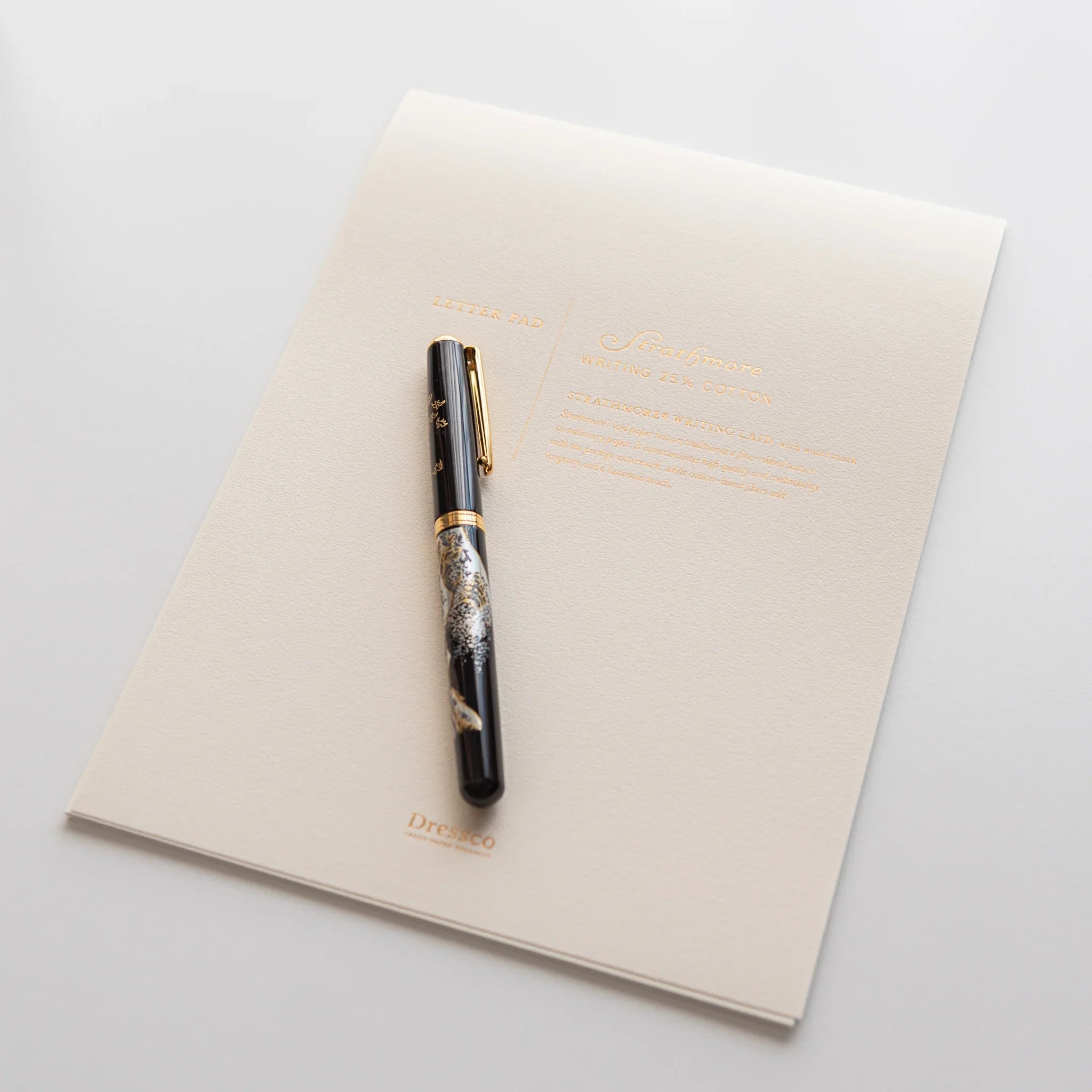Strathmore pad in flat lay position on neutral background showing cover and binding spine structure in composition