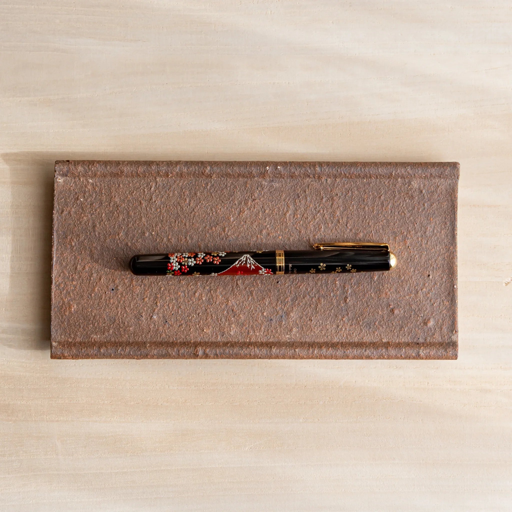Echizen Kawara yakishime clay ceramic pen tray with four slots shown in composition detail displayed in composition