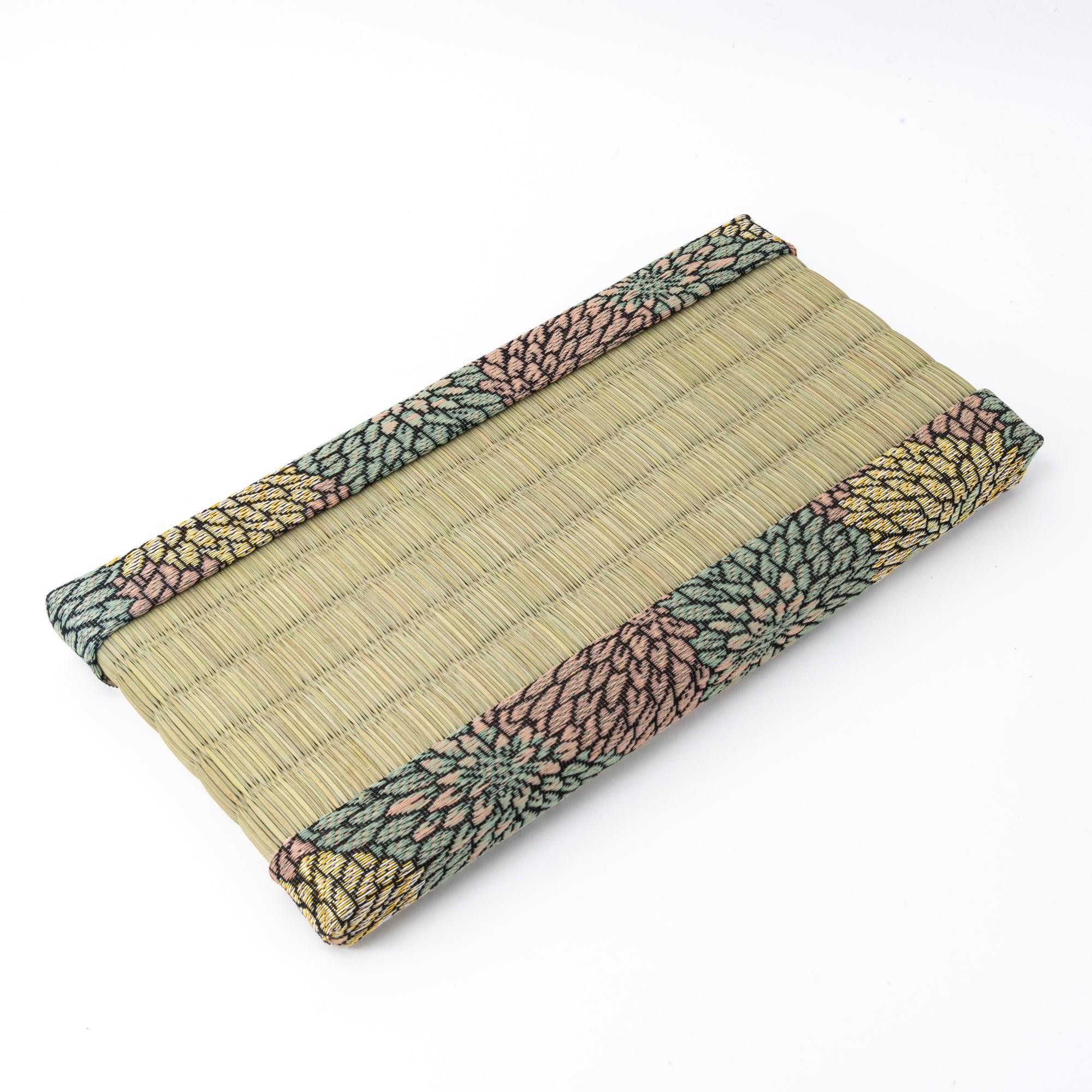 Three-quarter angled view of empty Chrysanthemum Tatami Pen Tray with tatami center and floral brocade edging
