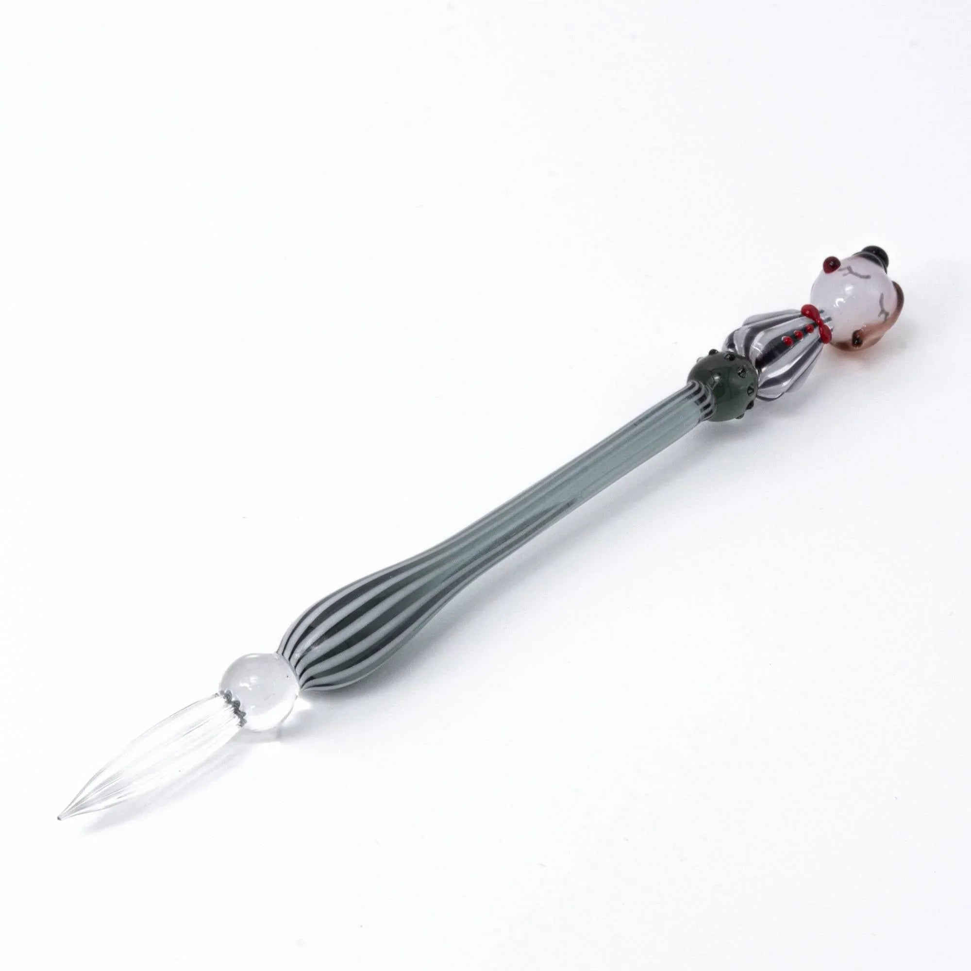 Moga-Chan stripe pattern glass dip pen full length with gray vertical stripes and character head with handle detail and