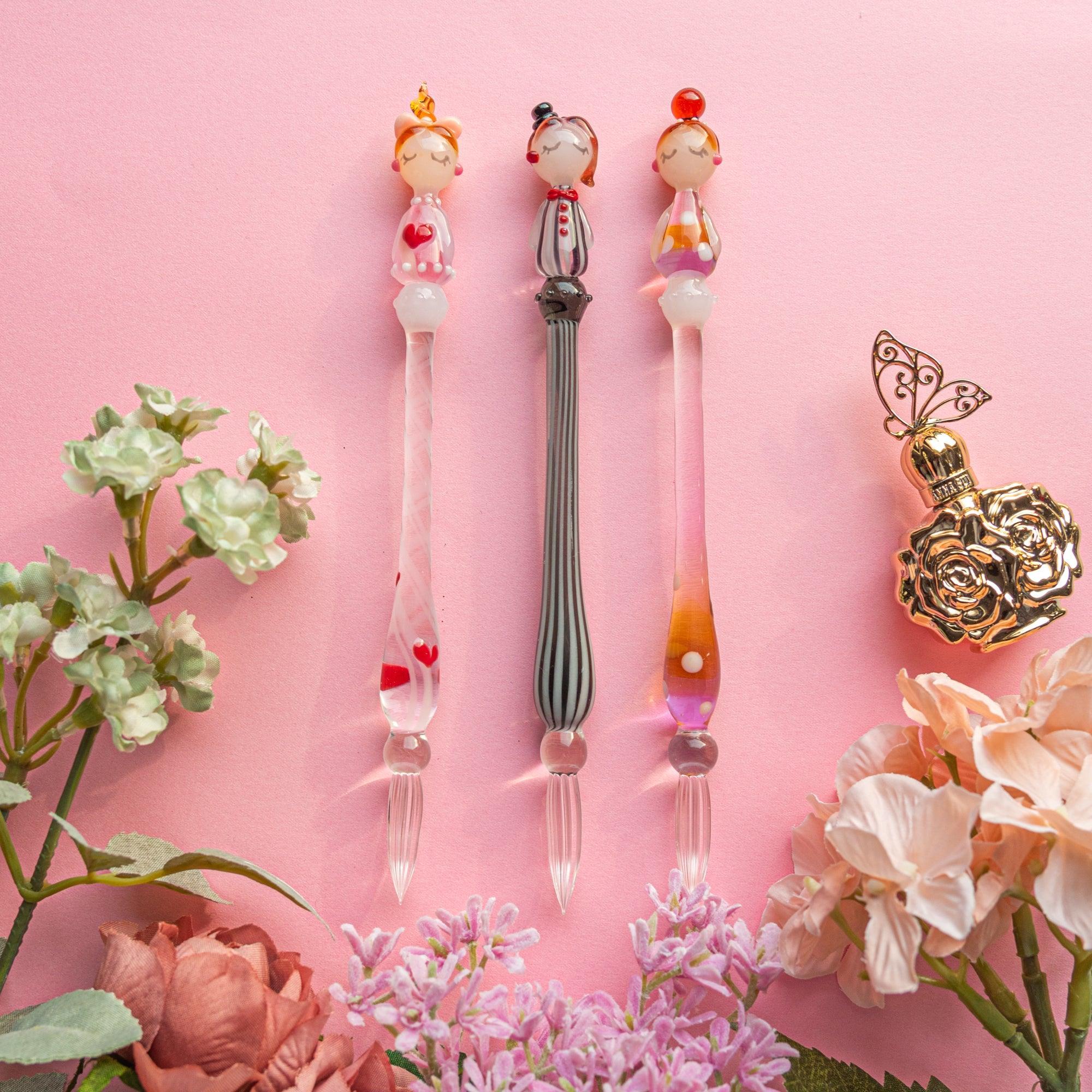 Fashionable Lady Moga-Chan glass dip pen angled view of striped gray glass handle and character with handle detail and