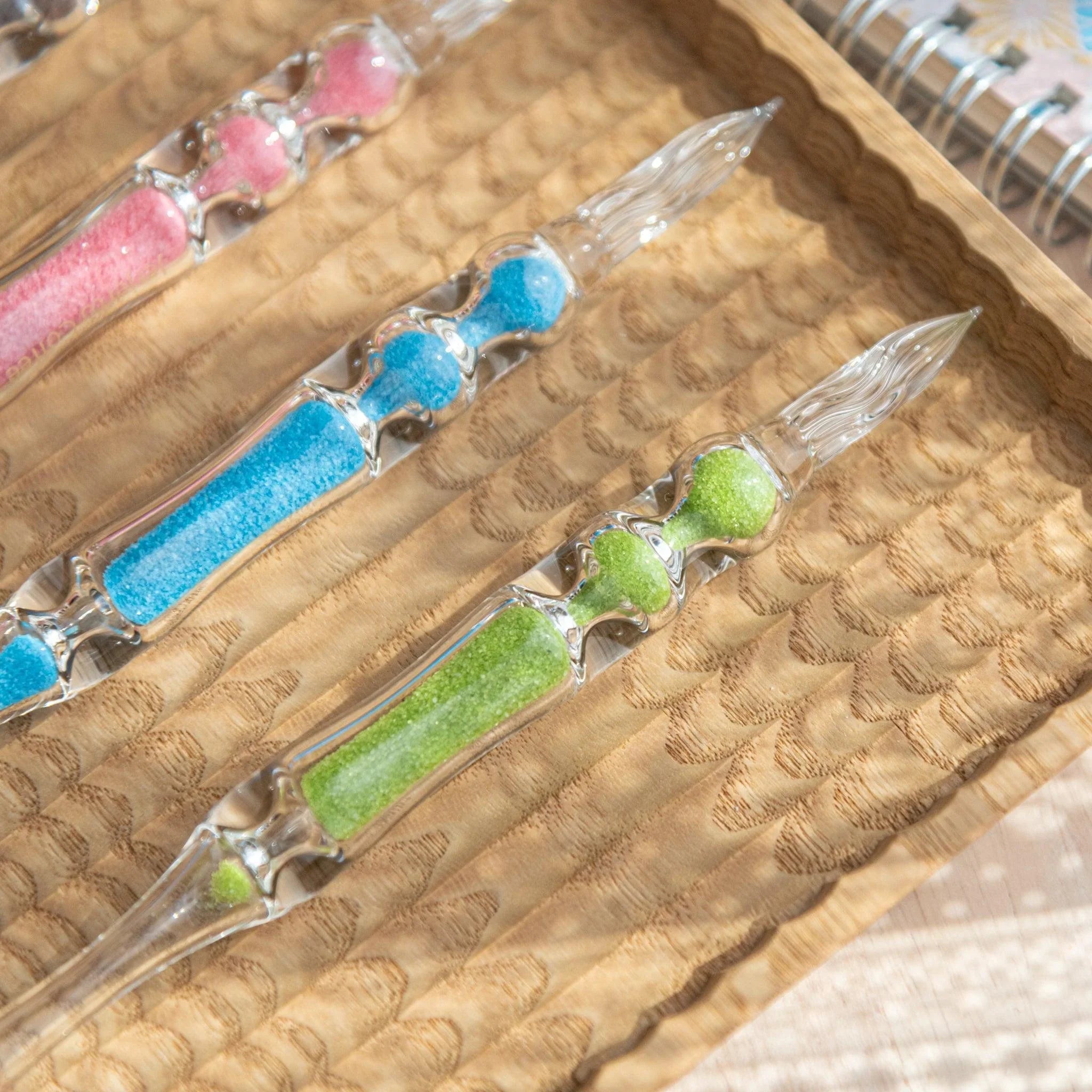 Fresh Green Hourglass Glass Dip Pen side profile of three green-toned glass chambers in hourglass form with nib